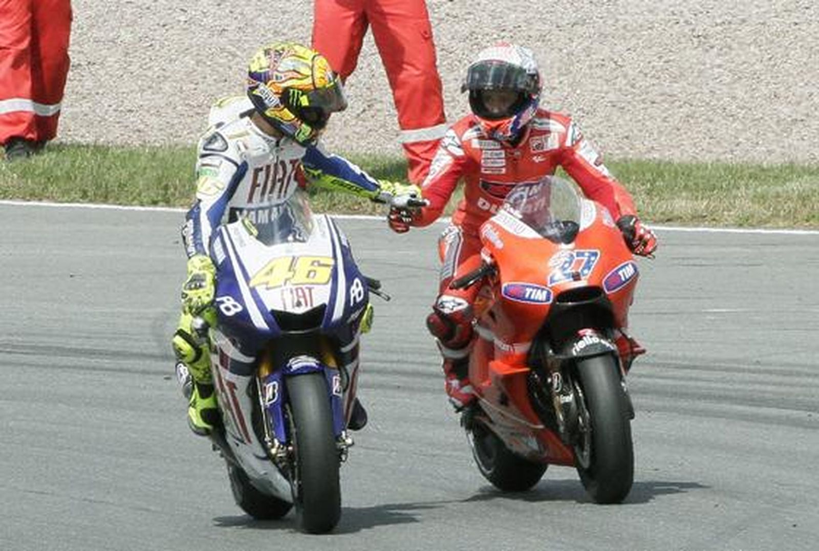 Pedrosa, Elías y Márquez firman una nueva jornada memorable para el motociclismo español. / Reportaje gráfico: EFE, Reuters, AFP.