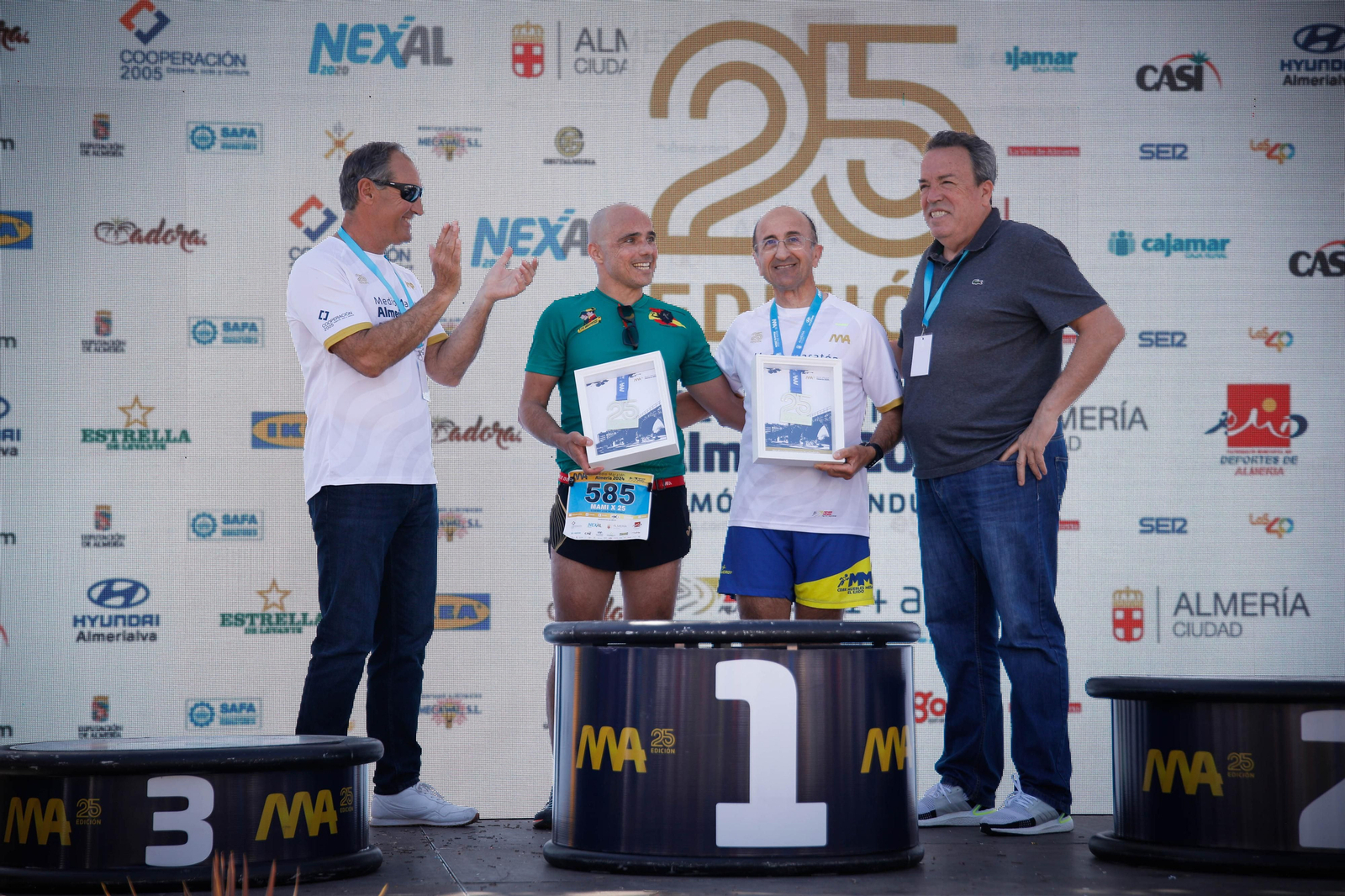 Imágenes de los premiados en la Media maratón de la Cuidad de Almería