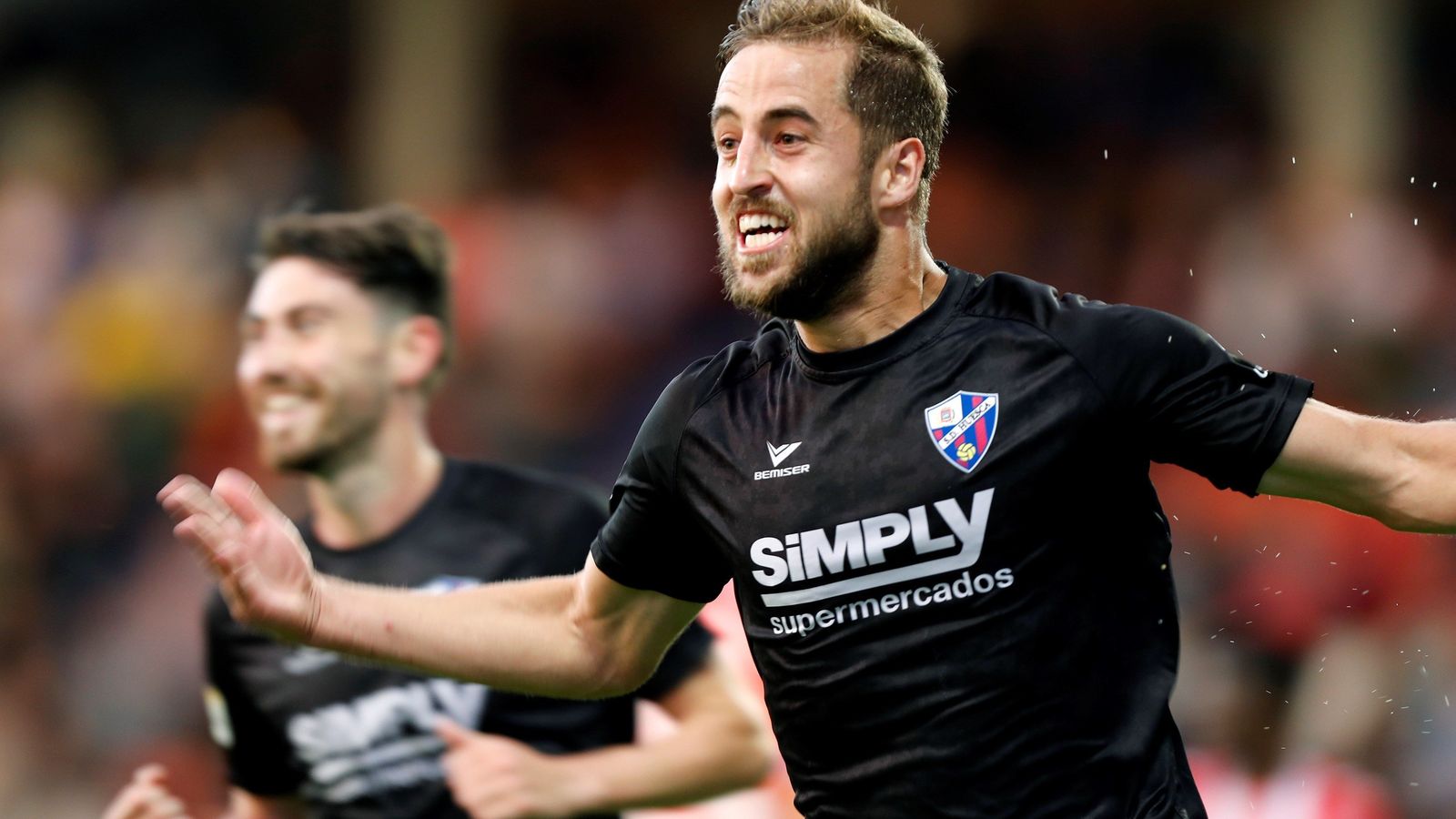 Pulido celebra el segundo tanto oscense.