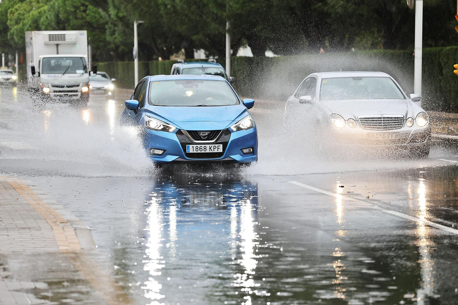 Imágenes de la lluviosa mañana de sábado en Huelva