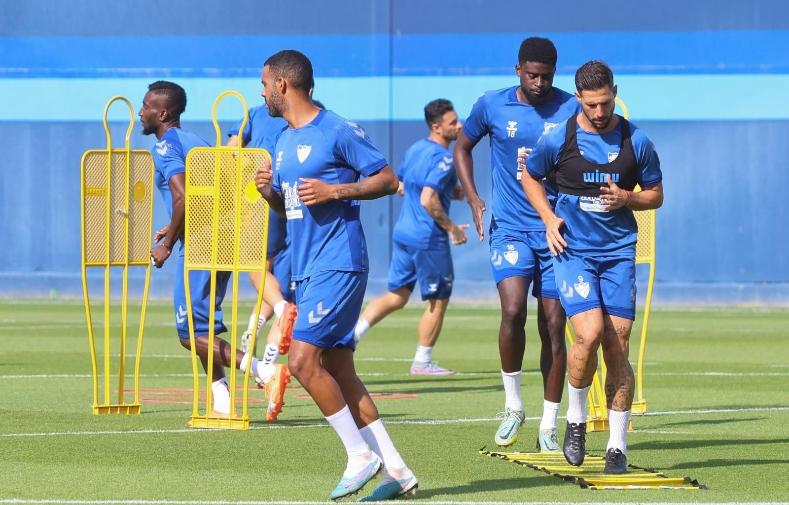 Caras serias en la vuelta al trabajo del Málaga CF