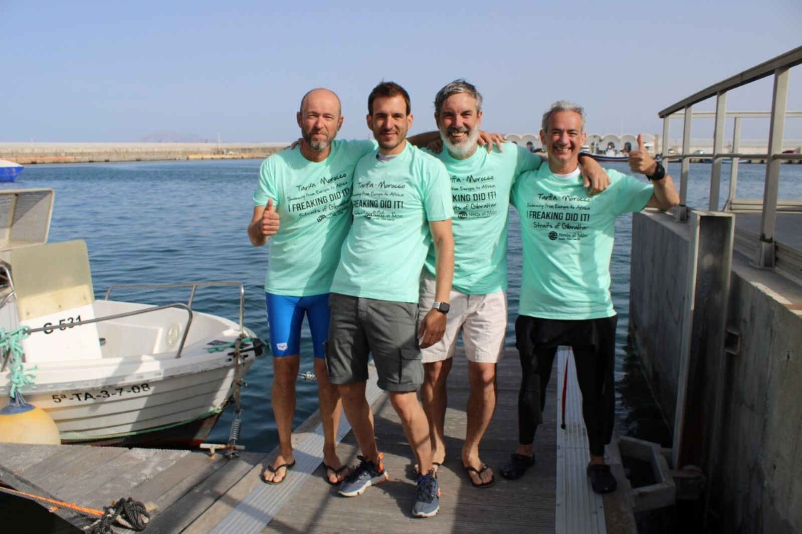 Los cuatro nadadores, tras su regreso a España