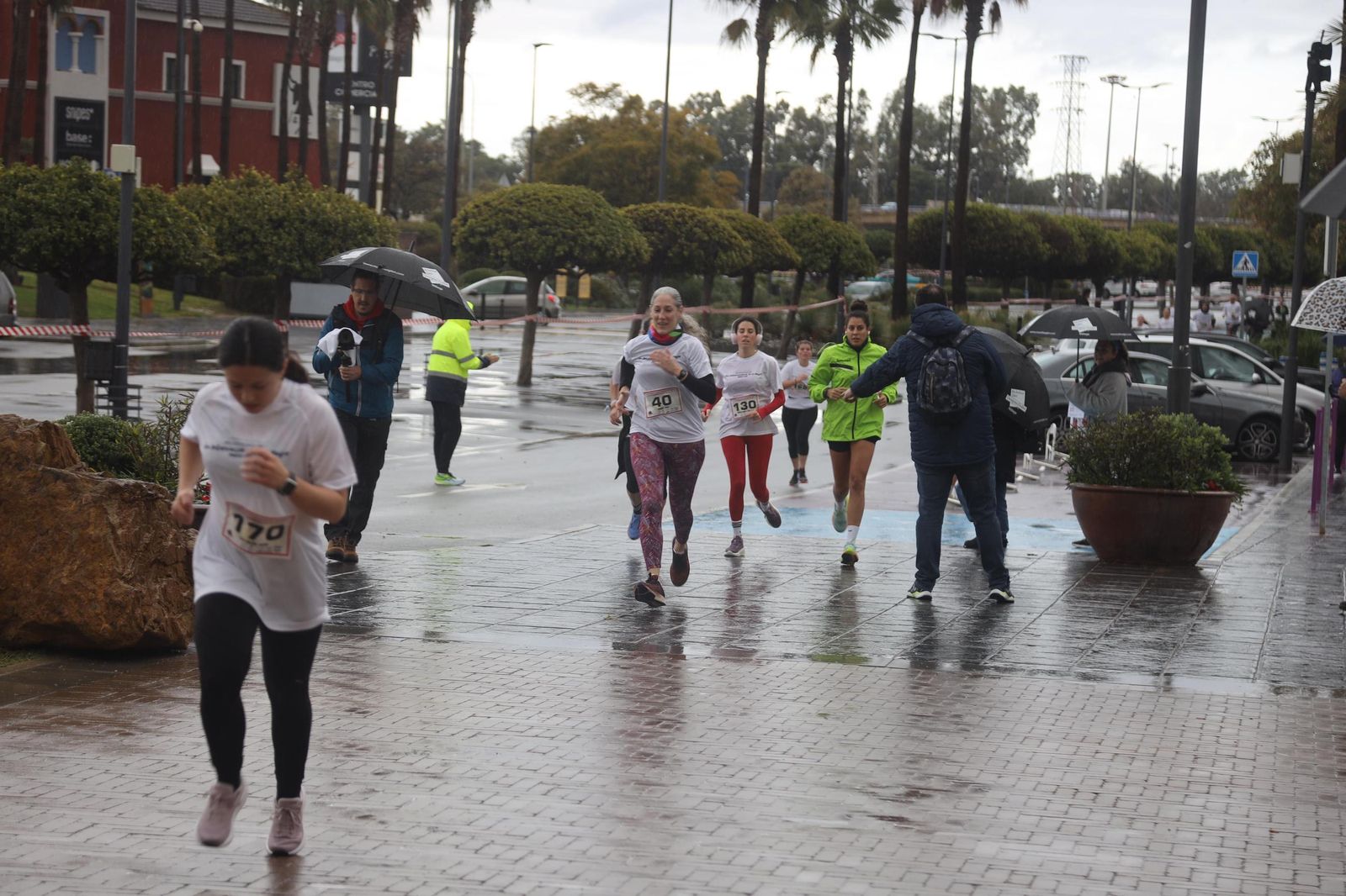 La Carrera por el Día Internacional de la Mujer en Málaga, en fotos