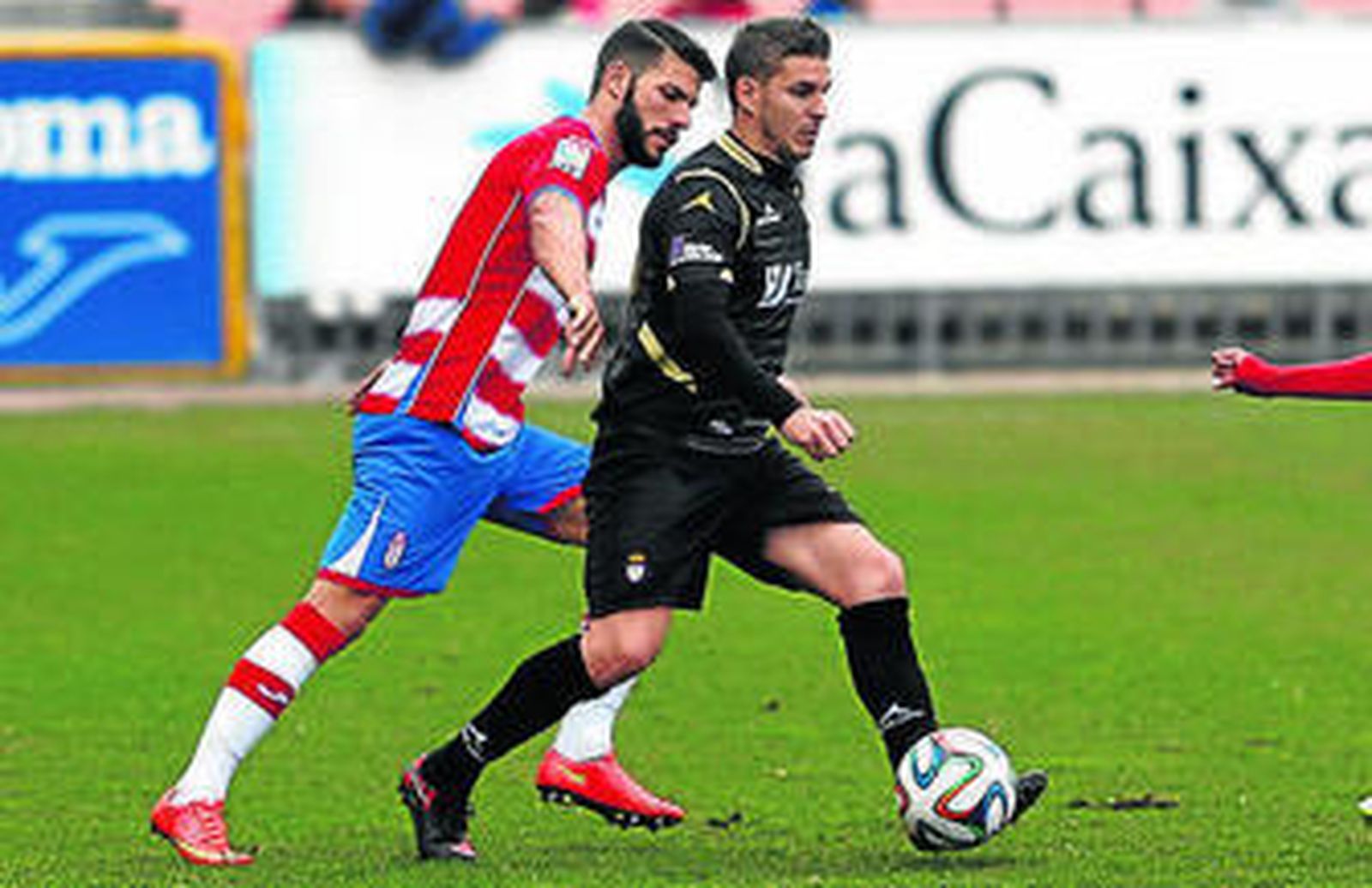 Un lance del choque de ayer entre Granada B y Real Jaén.