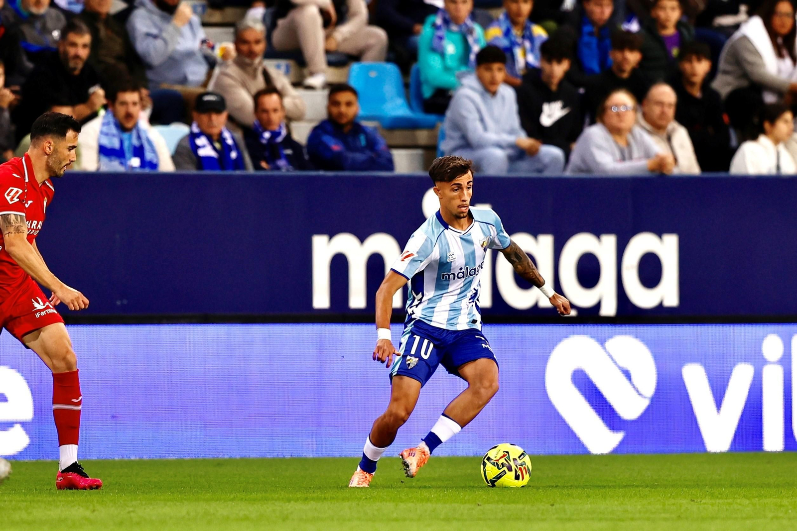 Las fotos del imponente ambiente en La Rosaleda en el Málaga - Córdoba CF