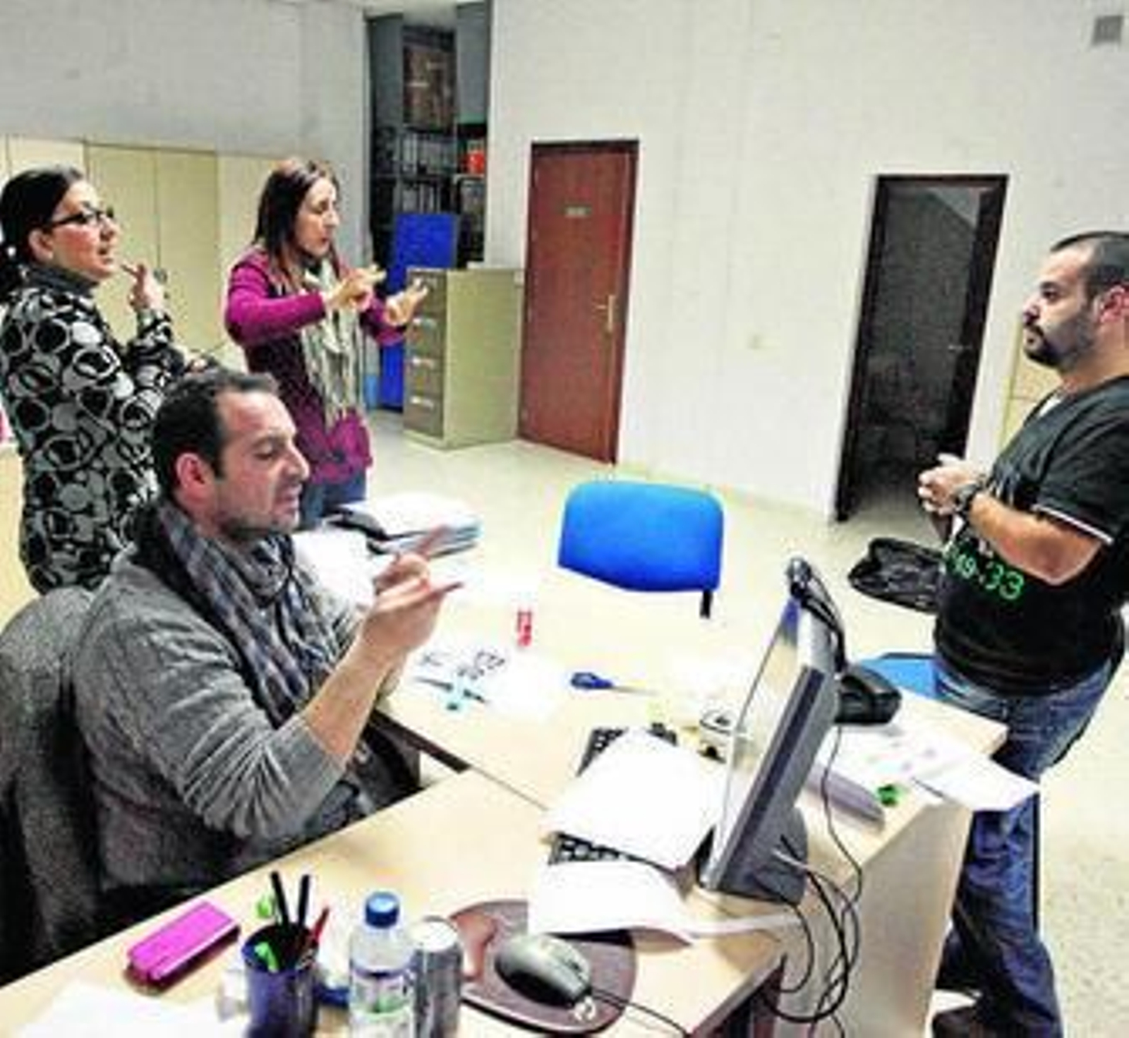 Trabajadores de la delegación onubense de la FAAS, en el Molino.