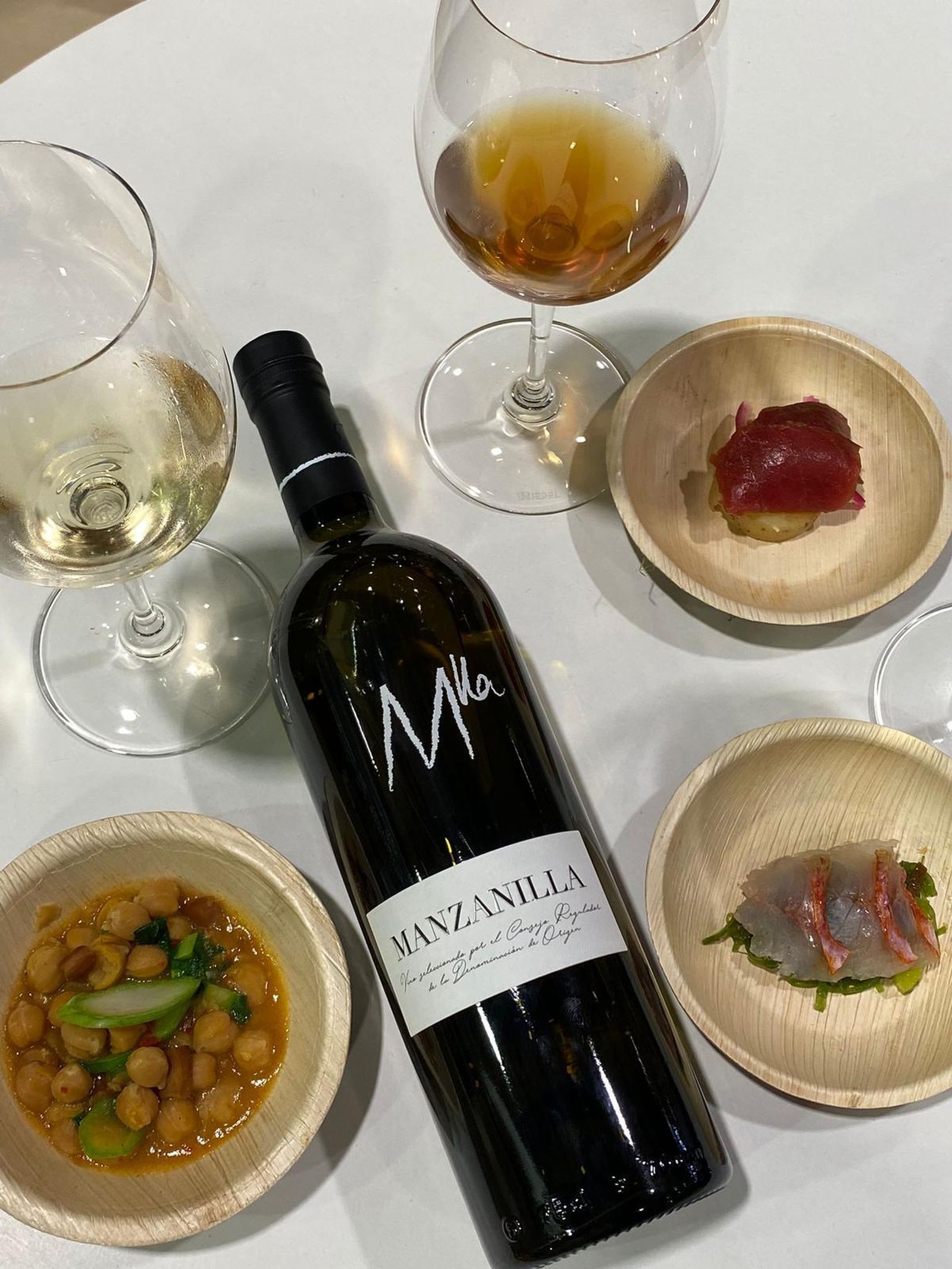Botella de Manzanilla de Sanlúcar con los maridajes propuestos en Madrid Fusión.