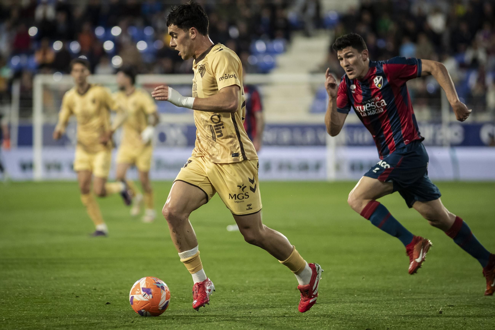El Huesca-Málaga CF, en fotos
