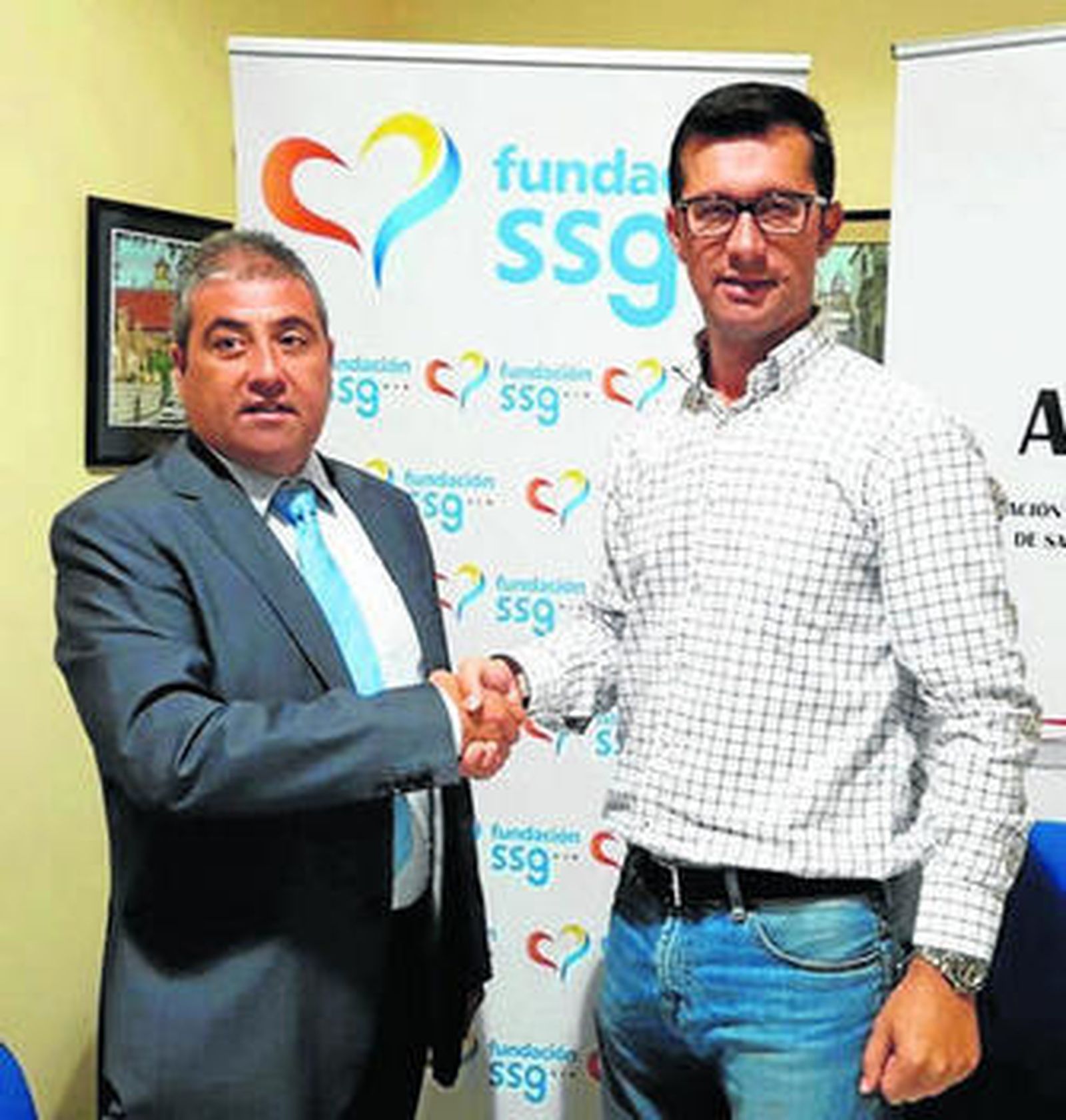 El representante de la Fundación SSG y el presidente de Apysan.