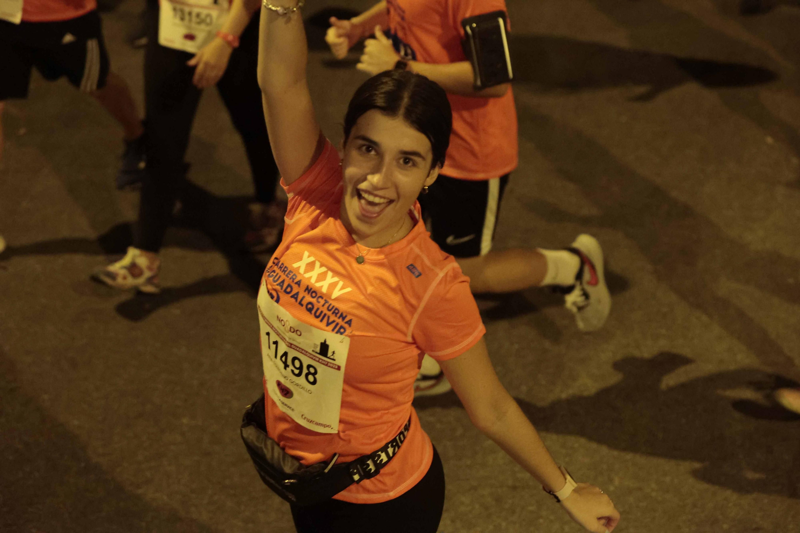 Búscate en las fotos de la Carrera Nocturna (III)