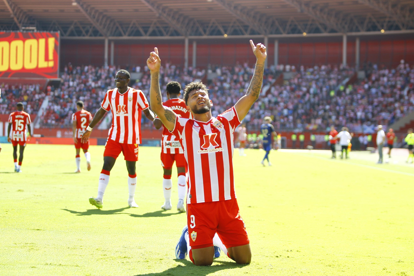 Imágenes del empate a 3 de la U.D. Almería y el Granada C.F.