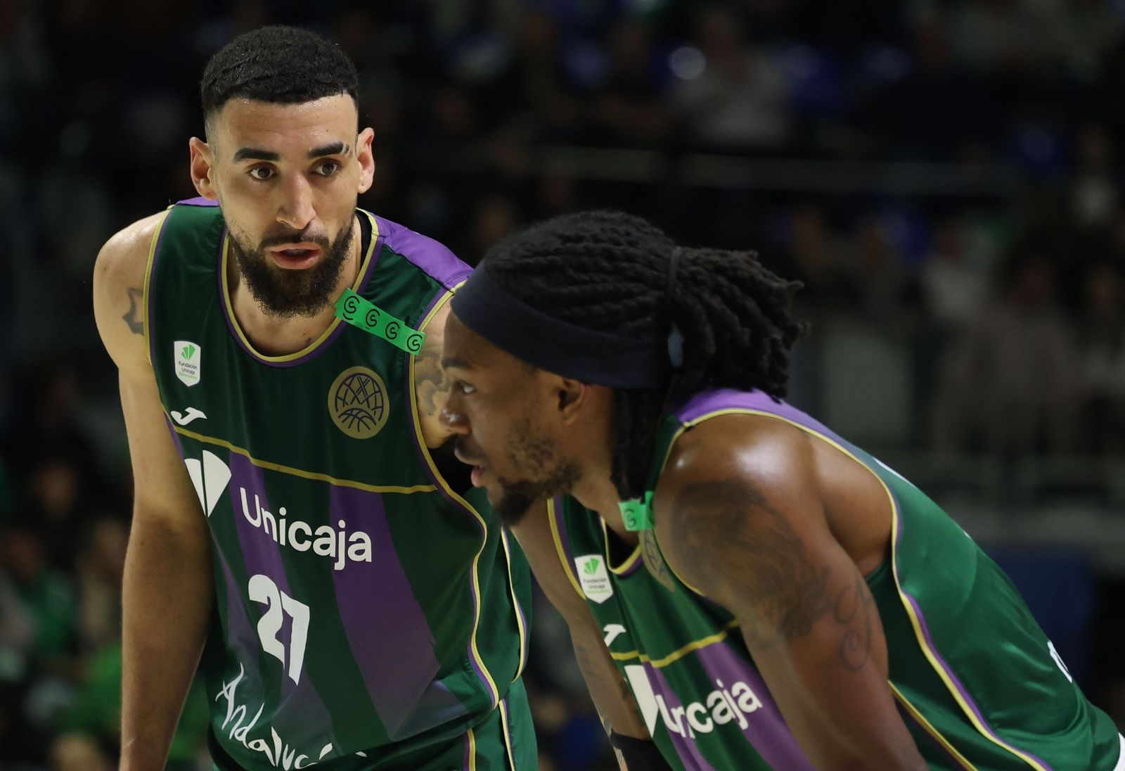 Chris Duarte y Kendrick Perry.