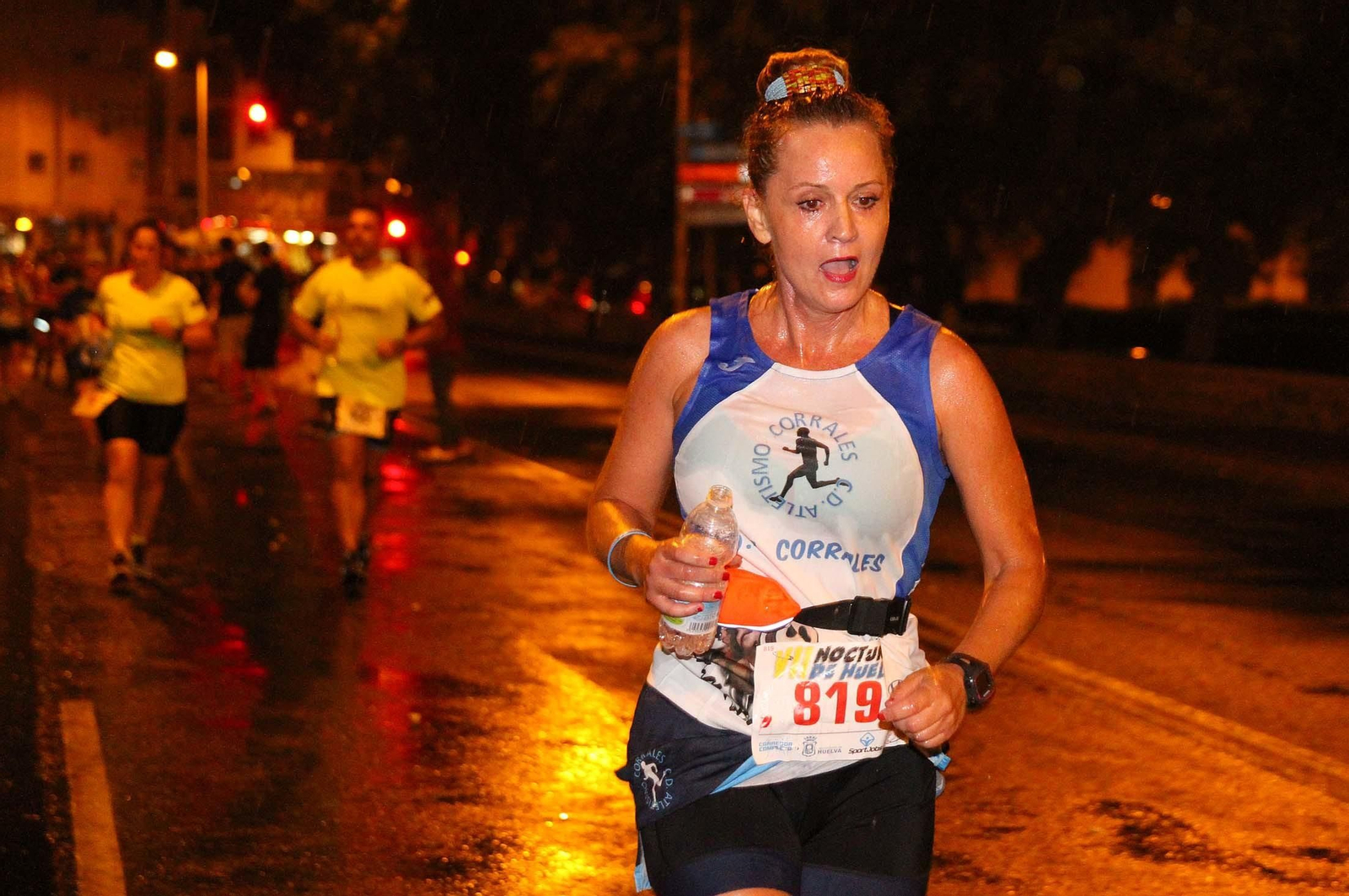 La VII Carrera Nocturna de Huelva en imágenes