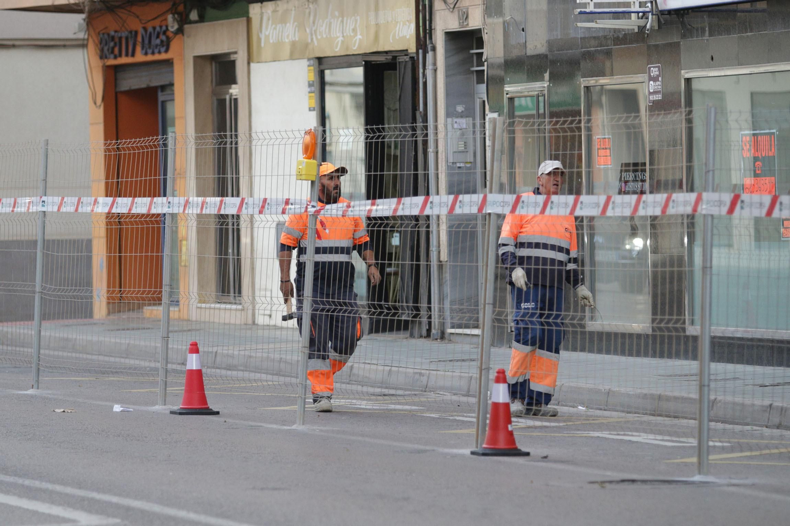 Operarios en las avenida