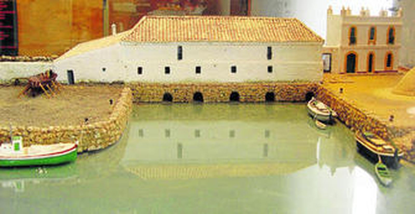 Vista del molino y del muelle del Zaporito según la maqueta realizada por Juan y José María Monteros Busto.