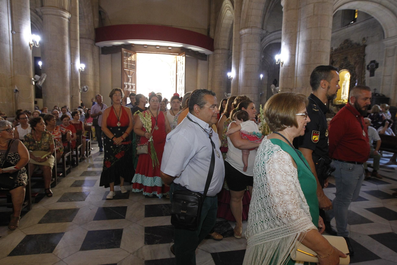 Fotogalería ofrenda floral a la Virgen del Mar. Feria de Almería 2019