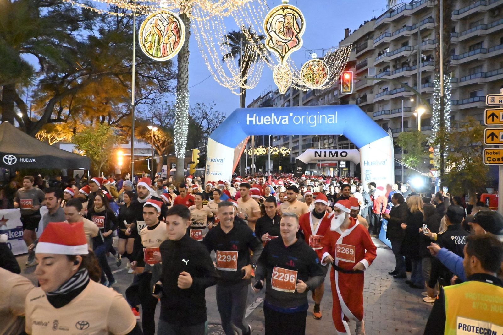 Búscate en las mejores fotografías de la San Silvestre de Huelva 2025