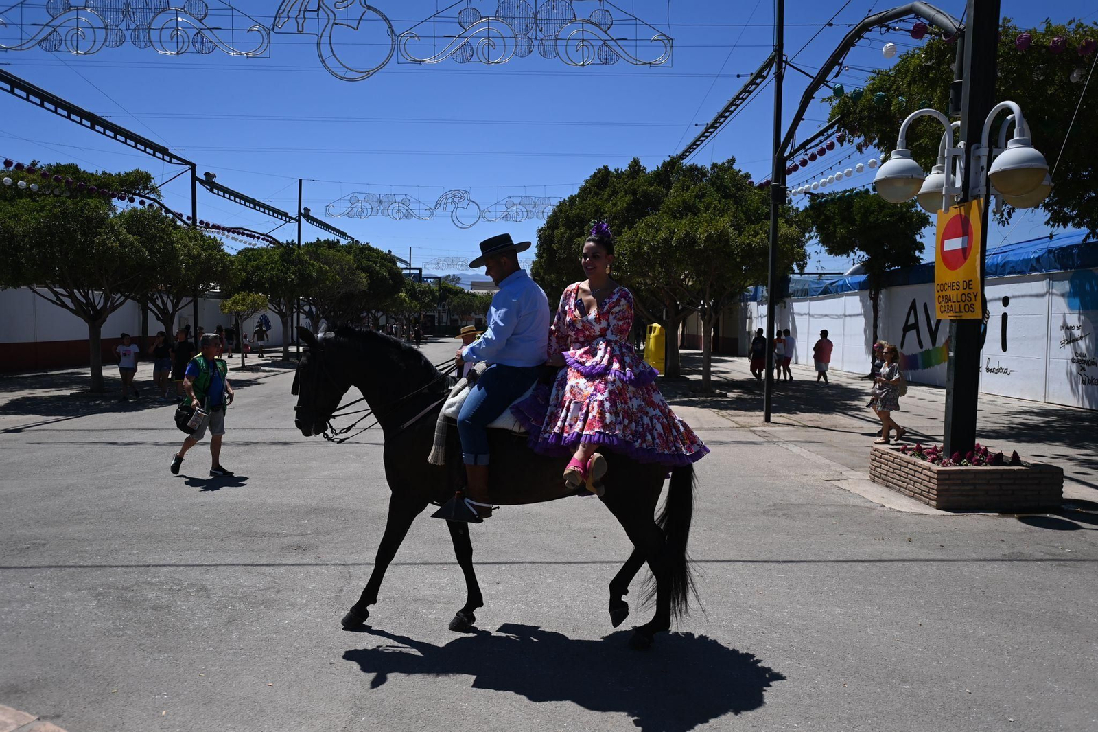Las fotos del lunes festivo en la Feria en Málaga