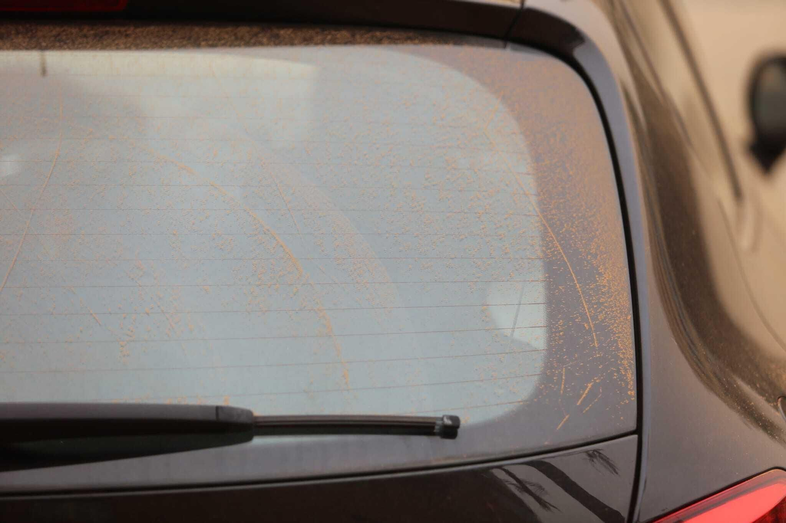Fotos del efecto de la calima en Málaga y en sus coches
