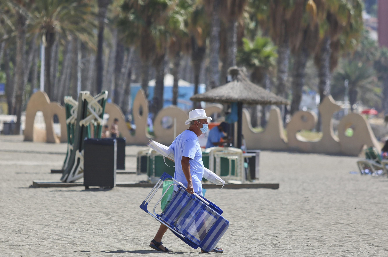 Fotos del primer día de mascarillas obligatorias en las playas y el Centro de Málaga