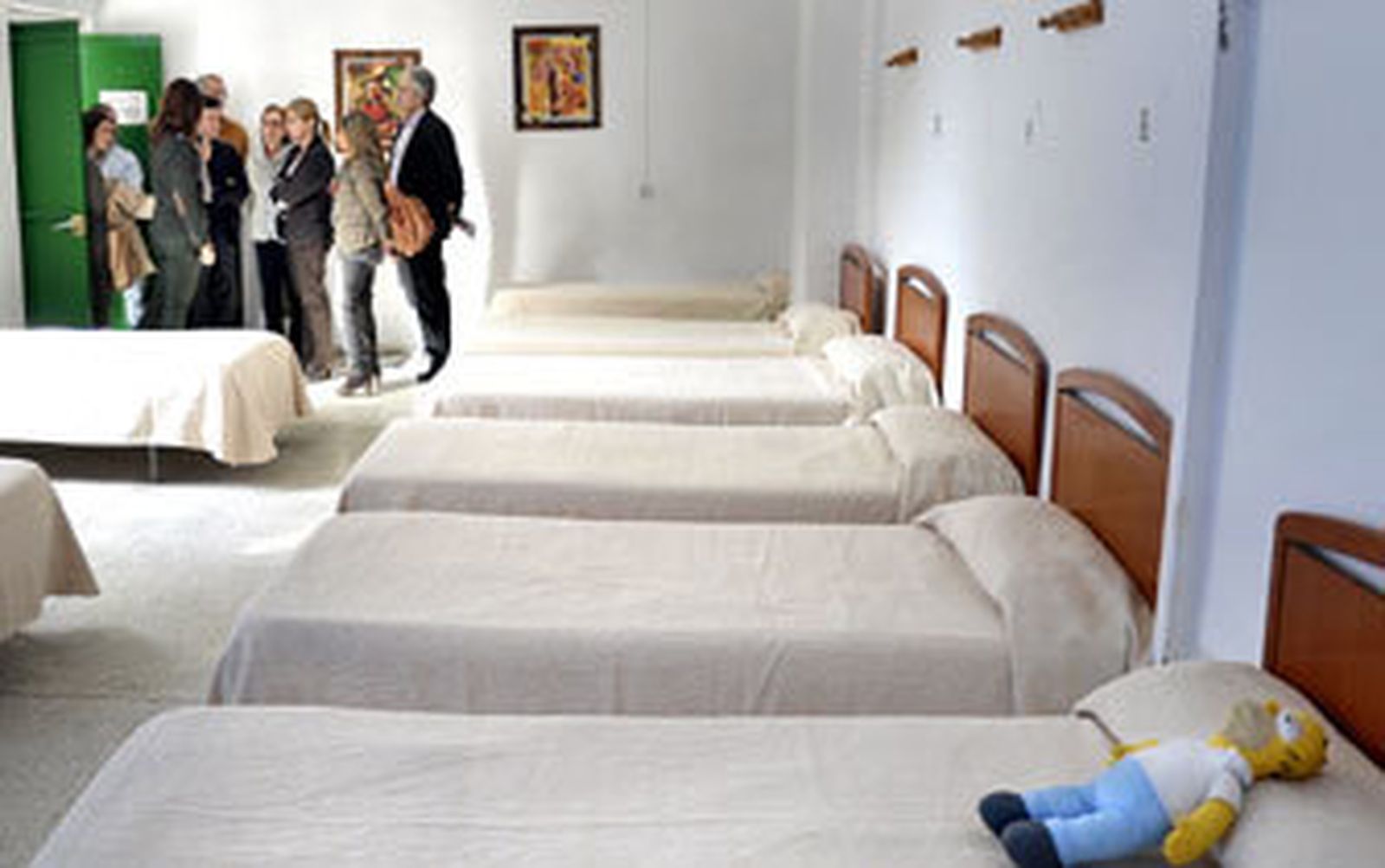 Imagen retrospectiva del interior del albergue, durante la inauguración de una nueva área en las instalaciones.