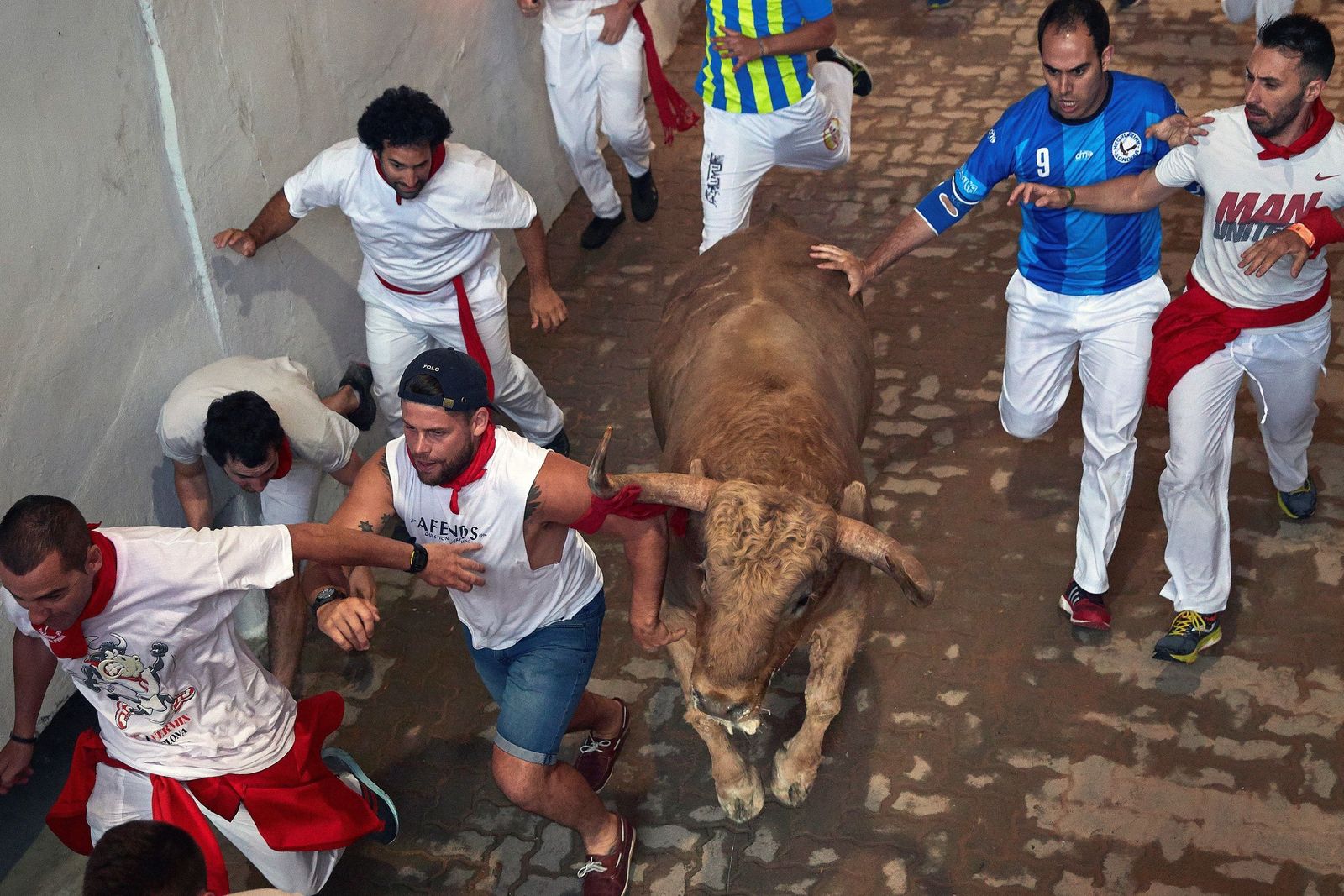 El quinto encierro de los Sanfermines, en imágenes