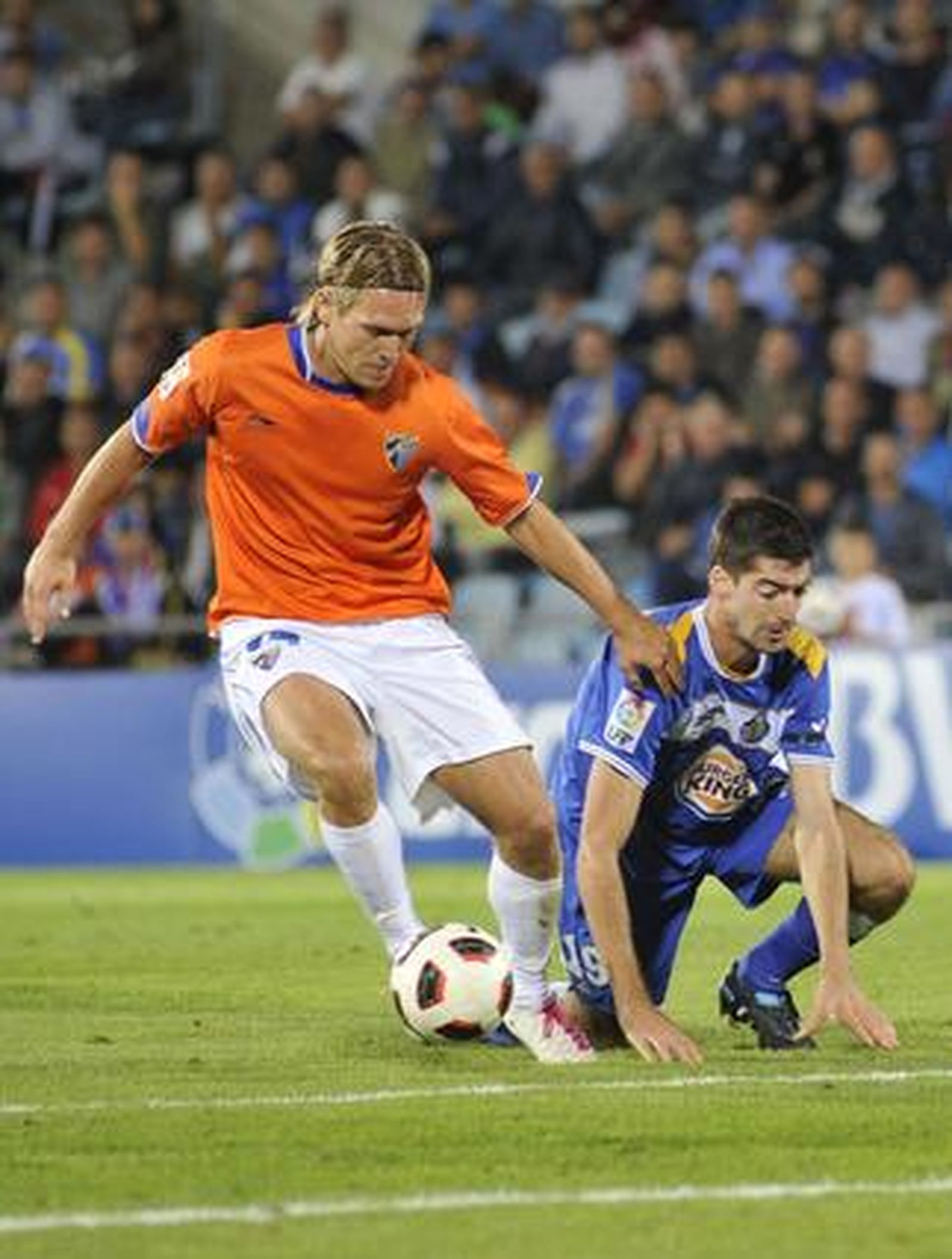 El Málaga gana su segundo partido de la temporada en Liga en casa del Getafe. / EFE