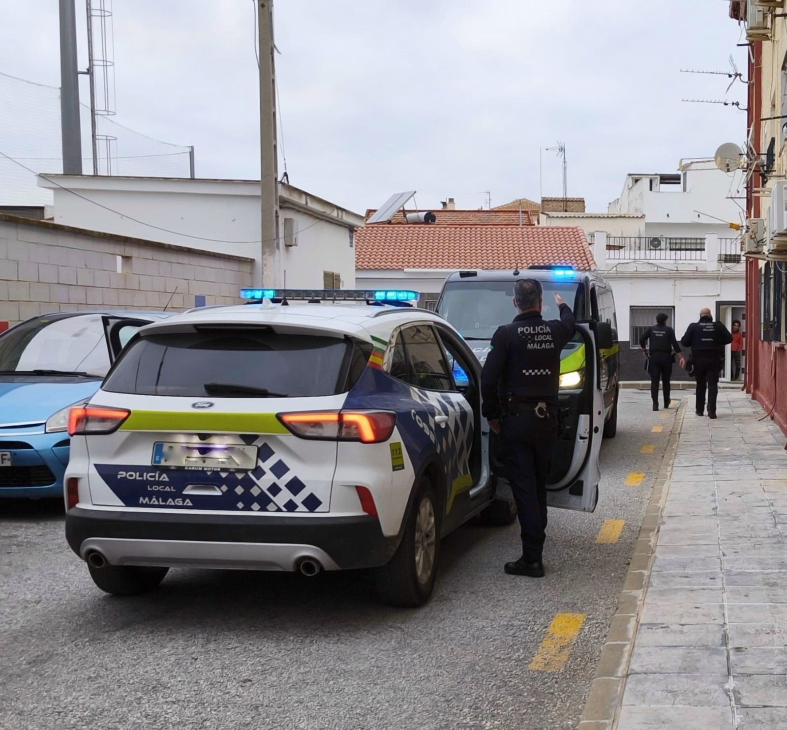 La Policía Local, tras parar el partido entre el Campanillas y el Churriana.