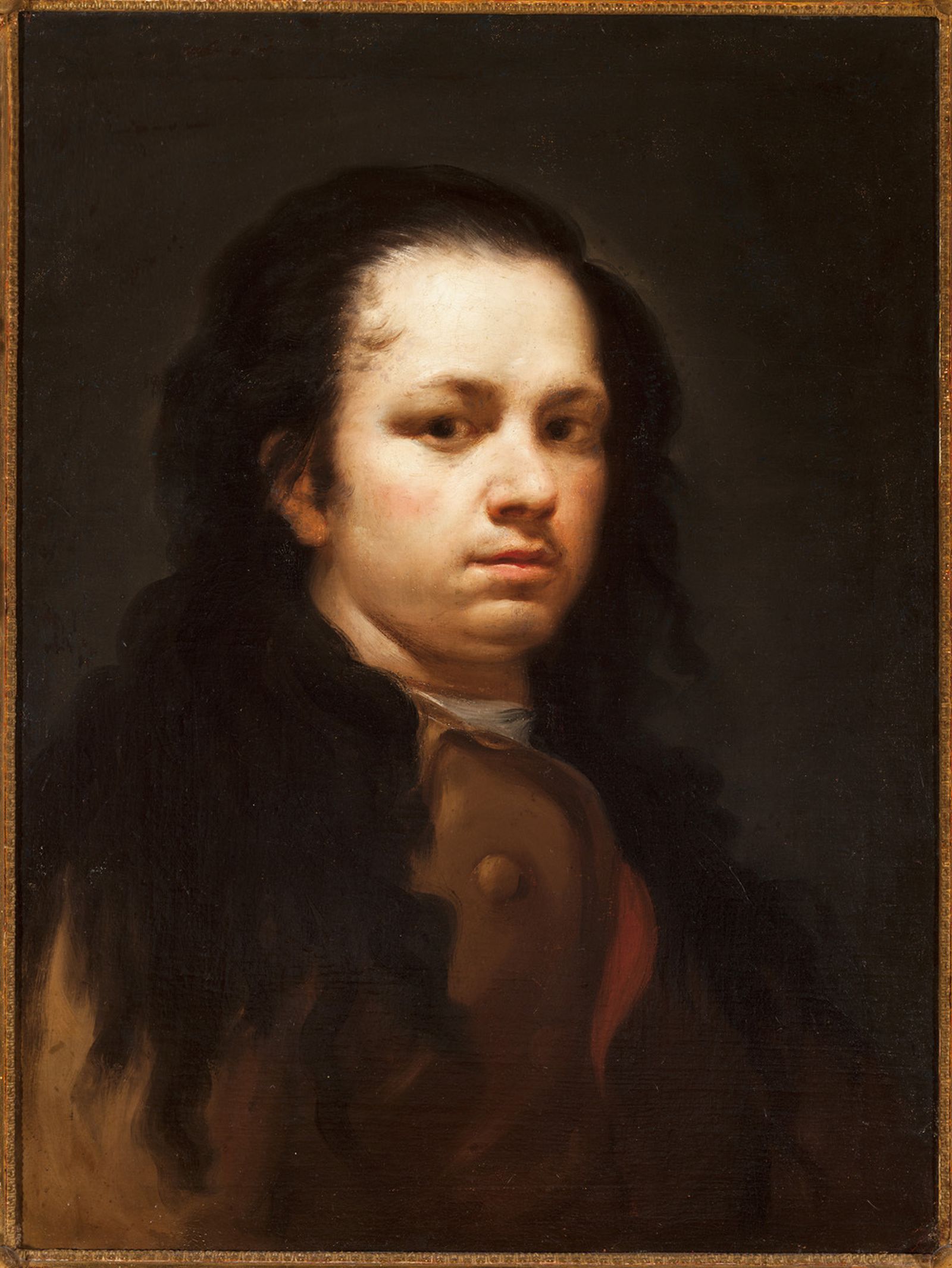 'Autorretrato' de Francisco de Goya, pintado entre 1775 y 1780, con el que arranca la muestra.