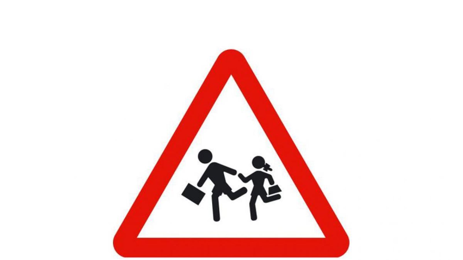 Señal de peligro por la proximidad de un colegio.