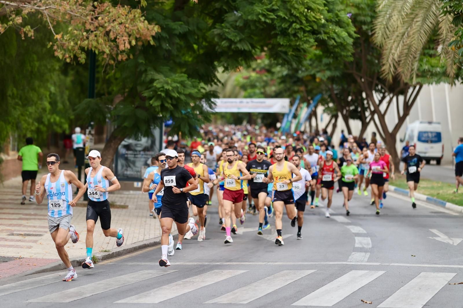 Las fotos de la VIII Carrera de la Prensa y la IV Marcha Solidaria de Málaga