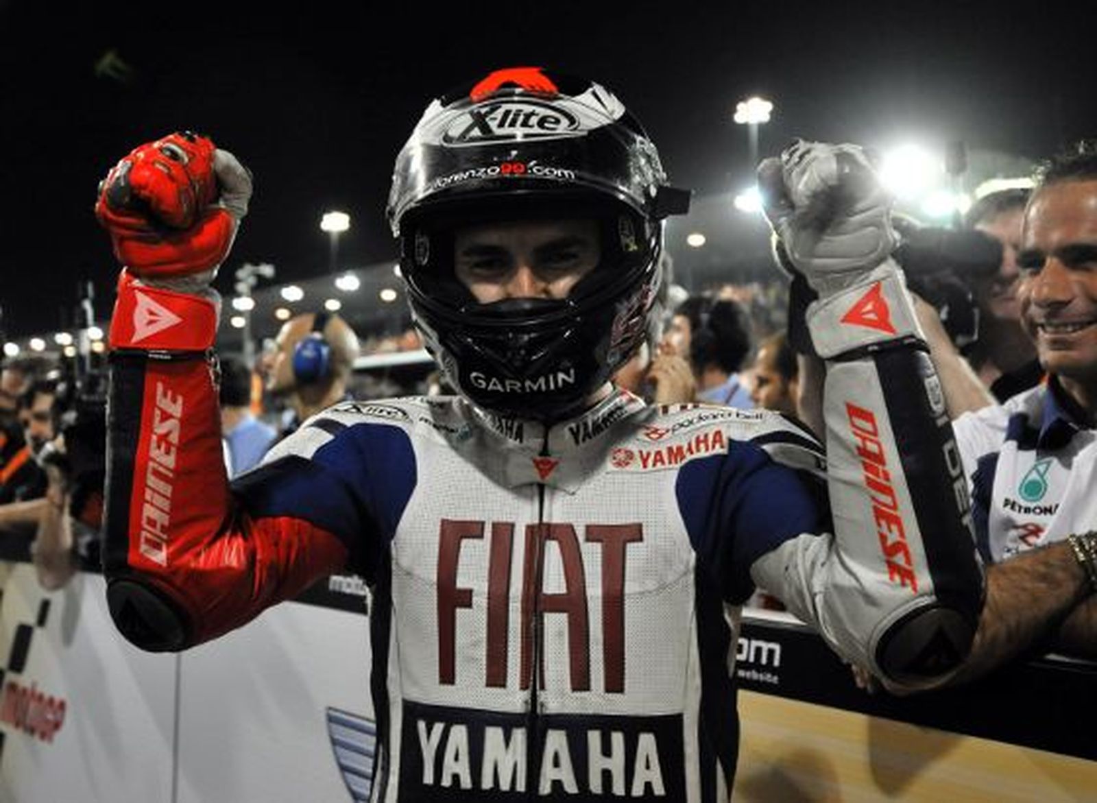 El piloto español Jorge Lorenzo se mostró exultante tras la carrera ya que consideró su segundo puesto como si fuera un triunfo

Foto: Agencias