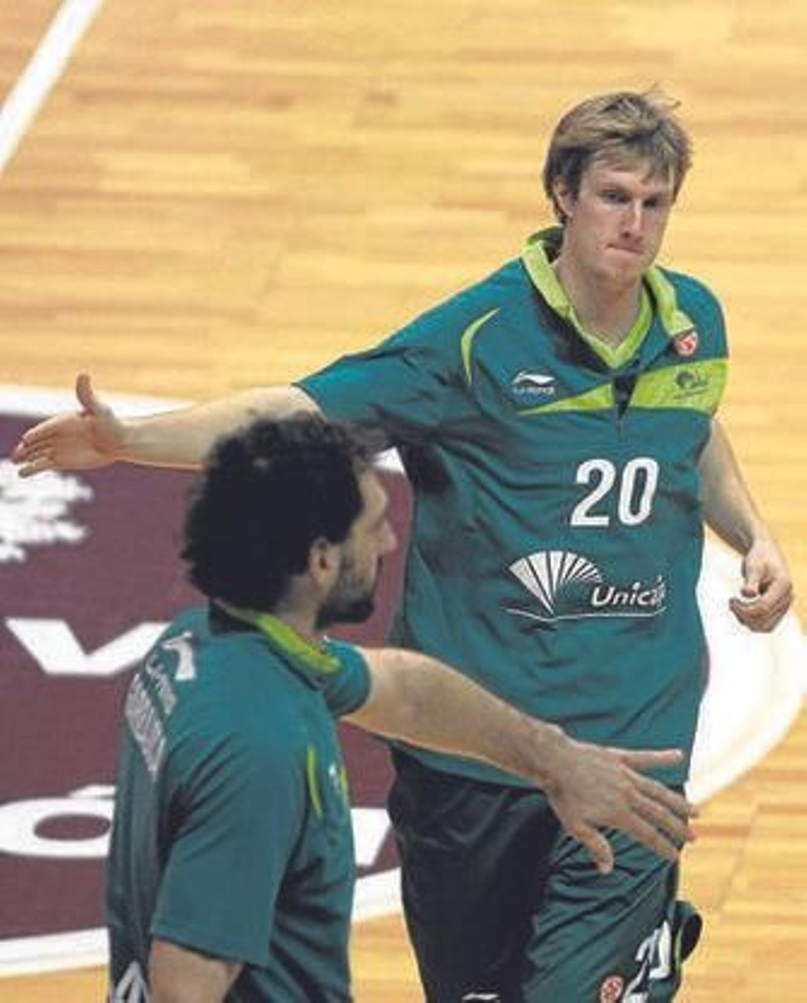 Payne y Garbajosa se saludan en un calentamiento.