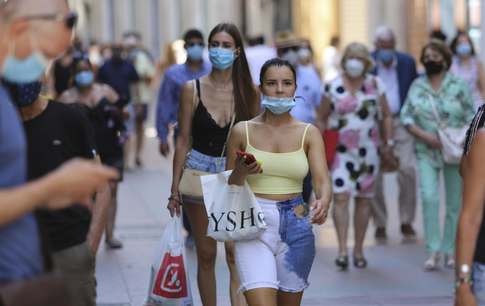 Fotos del primer día de mascarillas obligatorias en las playas y el Centro de Málaga
