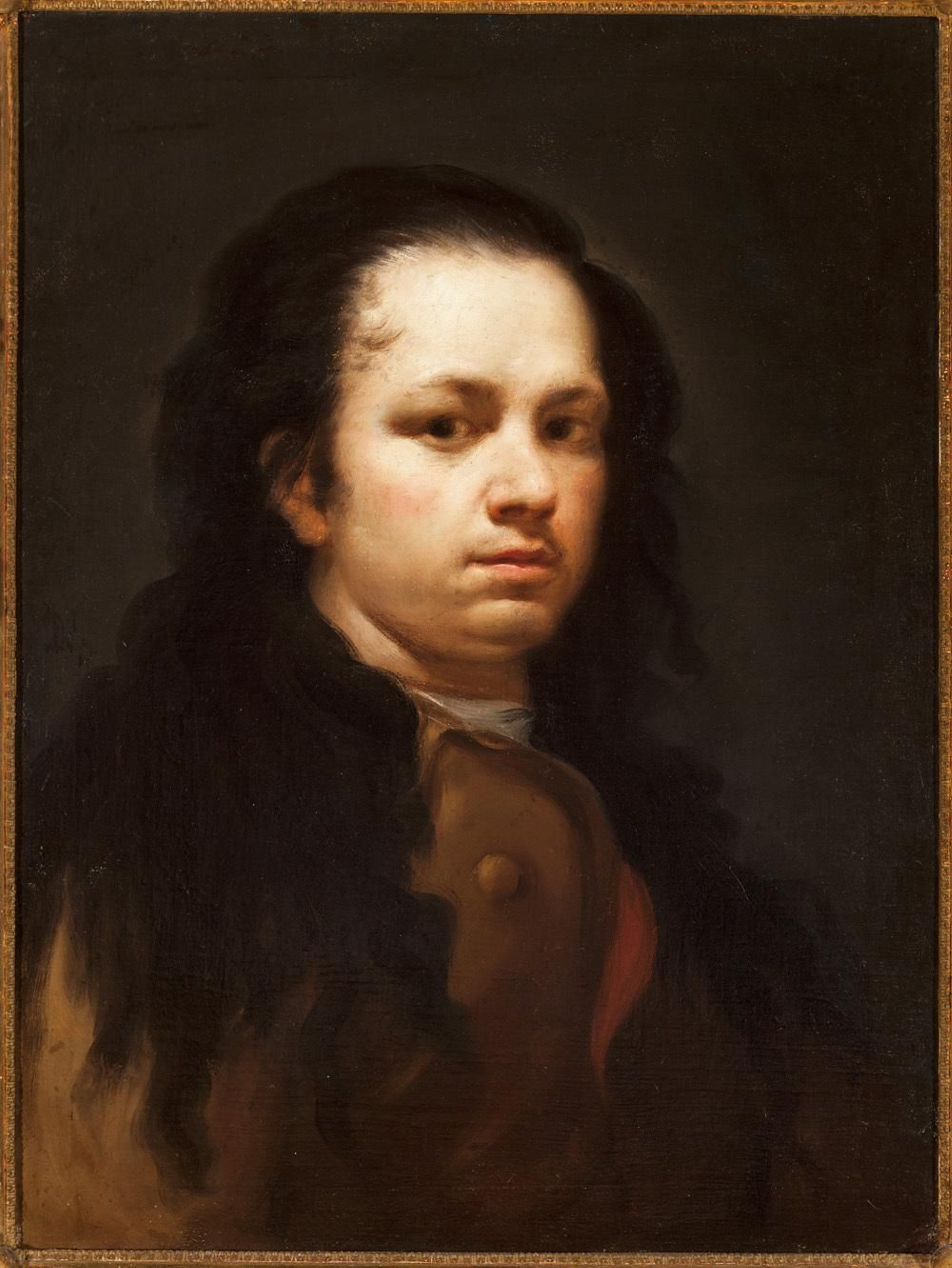'Autorretrato' de Francisco de Goya, pintado entre 1775 y 1780, con el que arranca la muestra.