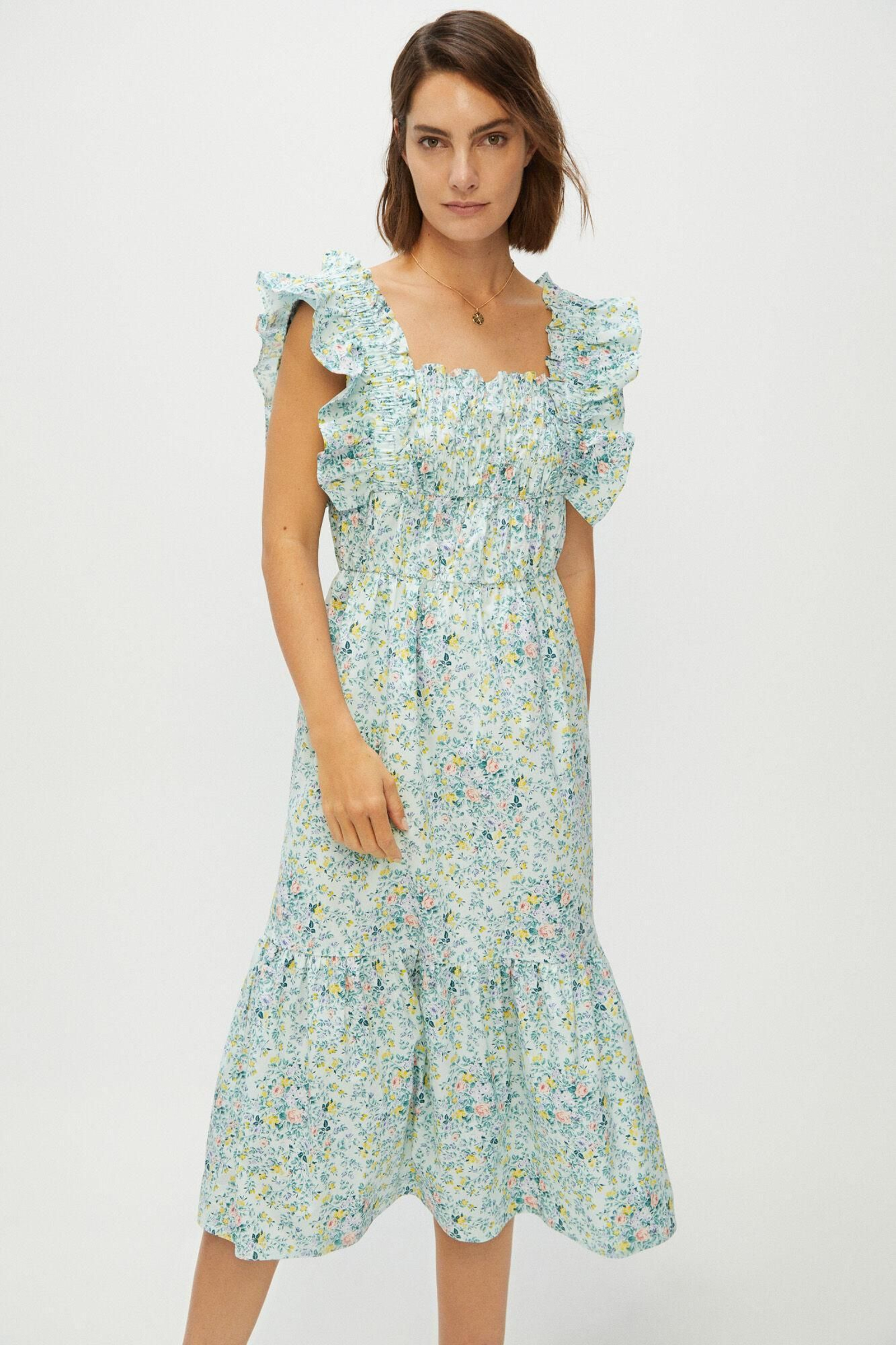 Vestido mariposa con estampado de flores de Cortefiel. Vestido mariposa con estampado de flores de Cortefiel.