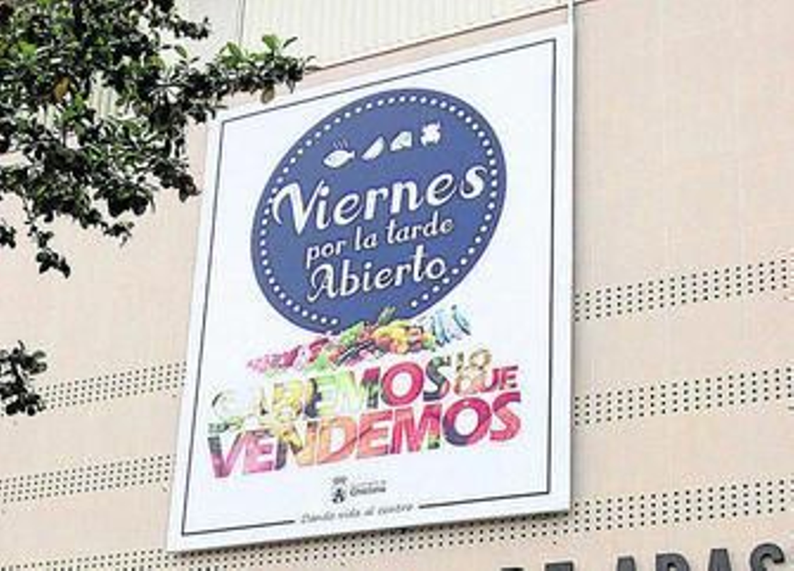 Cartel promocional de la campaña en la entrada principal al Mercado.
