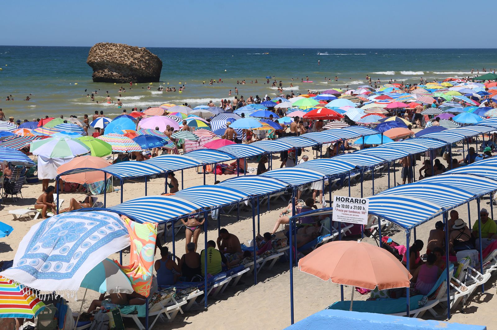 Imágenes de una mañana de calor y playa en Matalascañas