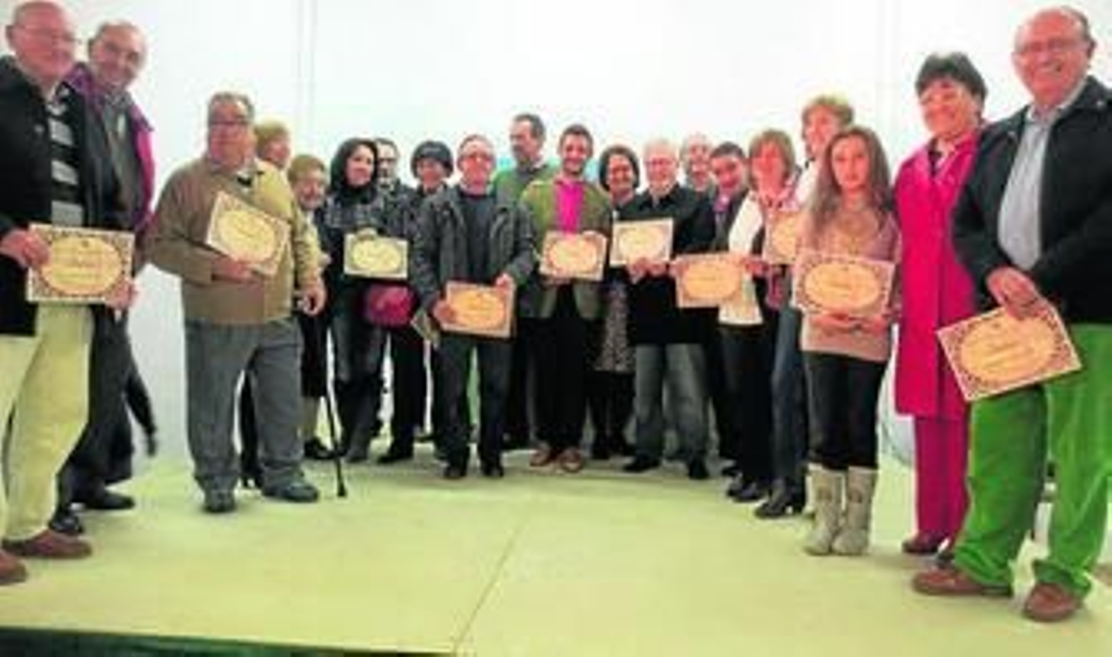 Concejales posan con los premiados, ayer, en el Hotel Garrido.