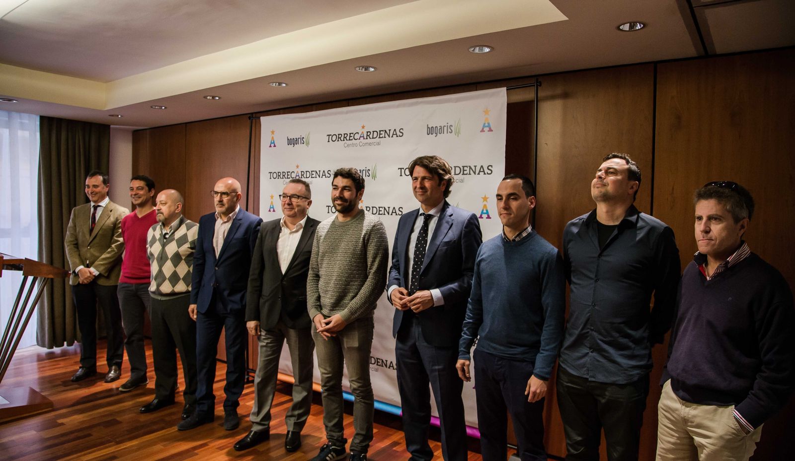 Los tres galardonados y los integrantes del jurado en la entrega de los premios ayer
