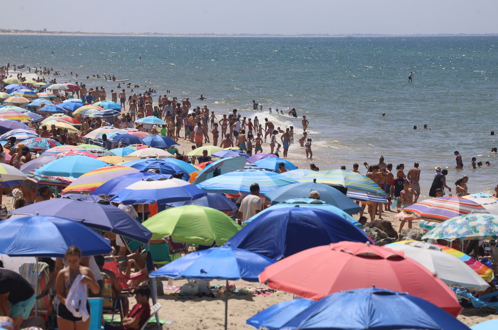 Imágenes de una mañana de calor y playa en Matalascañas