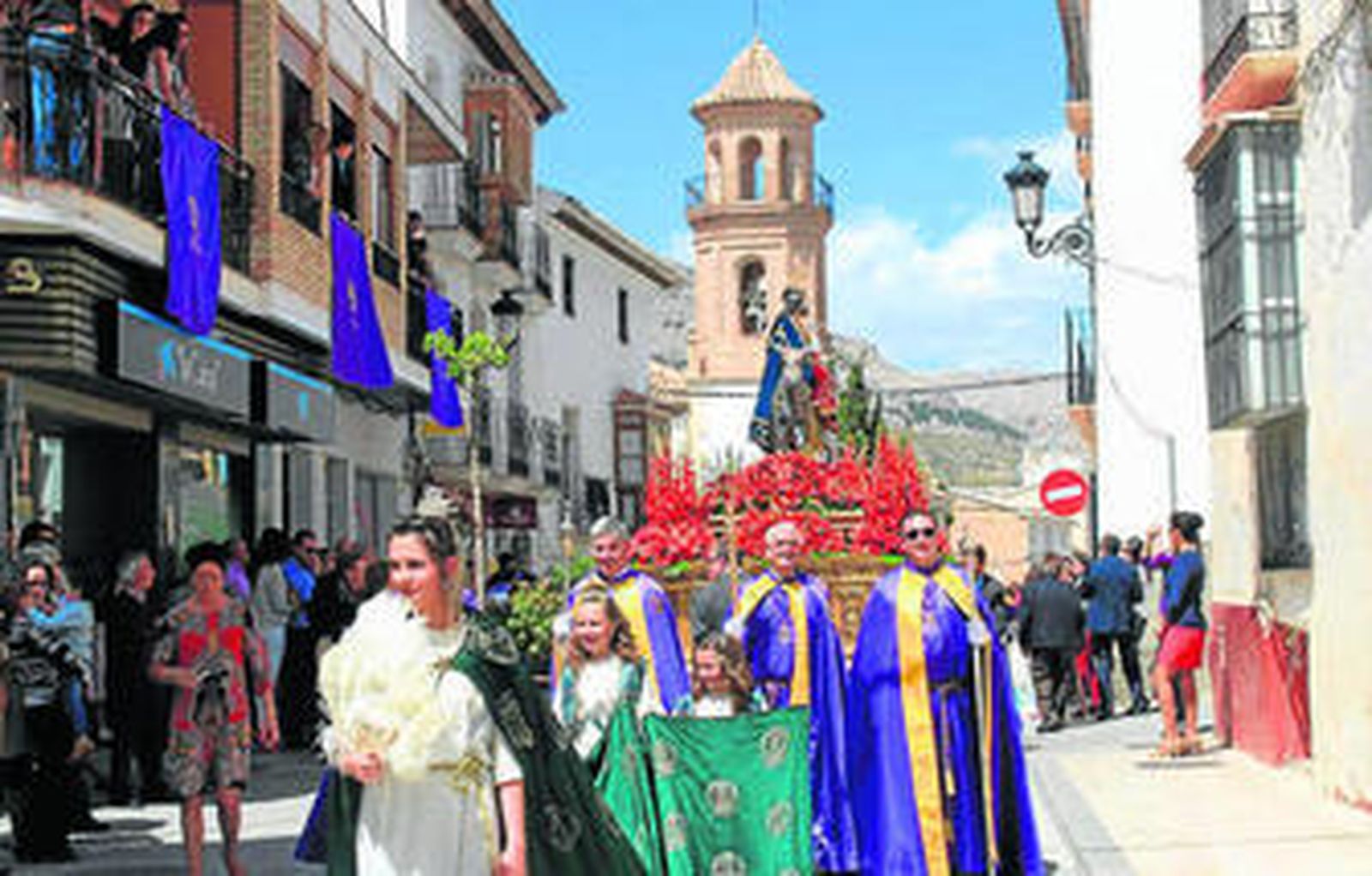 El Paso de la Borriquita por las calles velezanas.