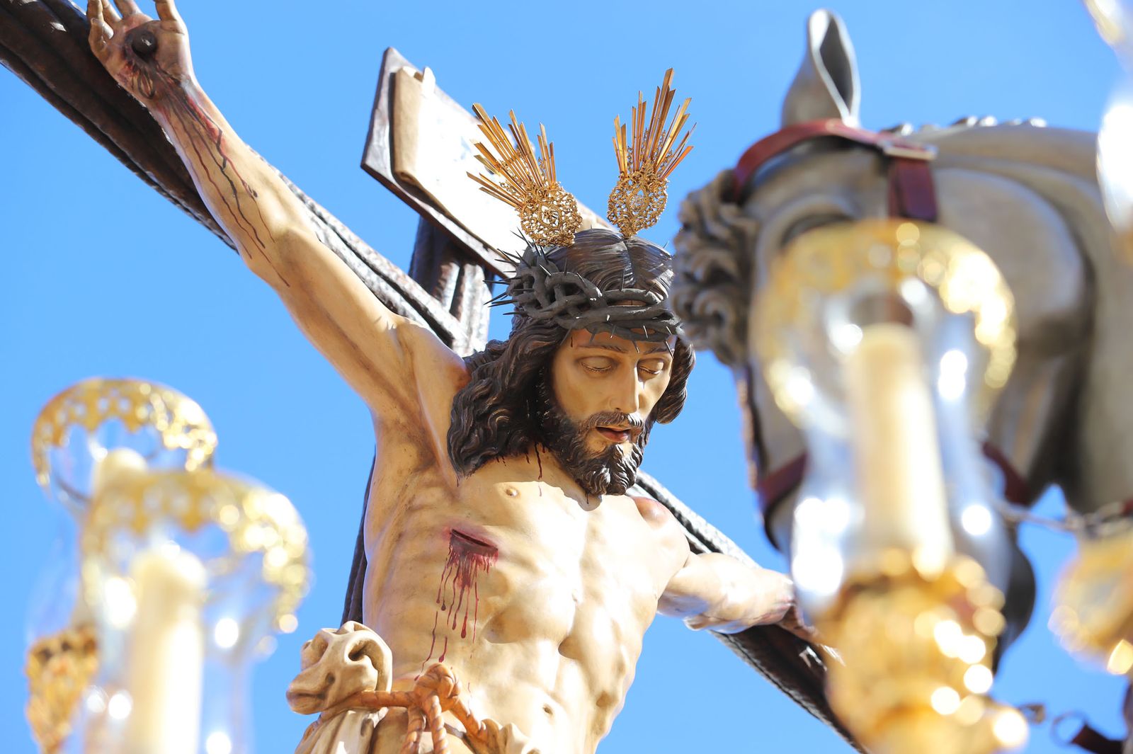 Imágenes de la procesión de la hermandad de la Lanzada de Huelva