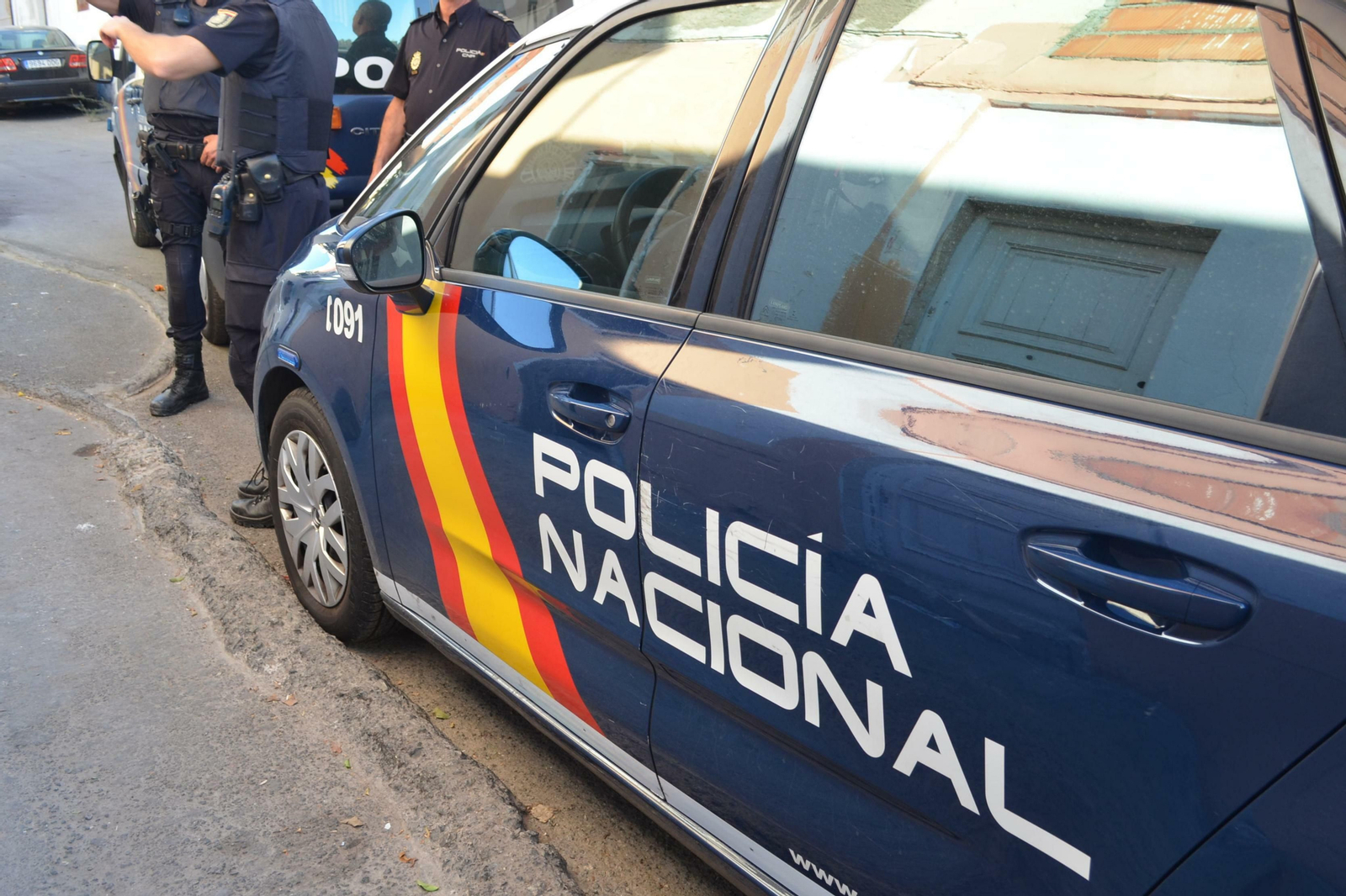 Un coche patrulla de la Policía Nacional durante una actuación.