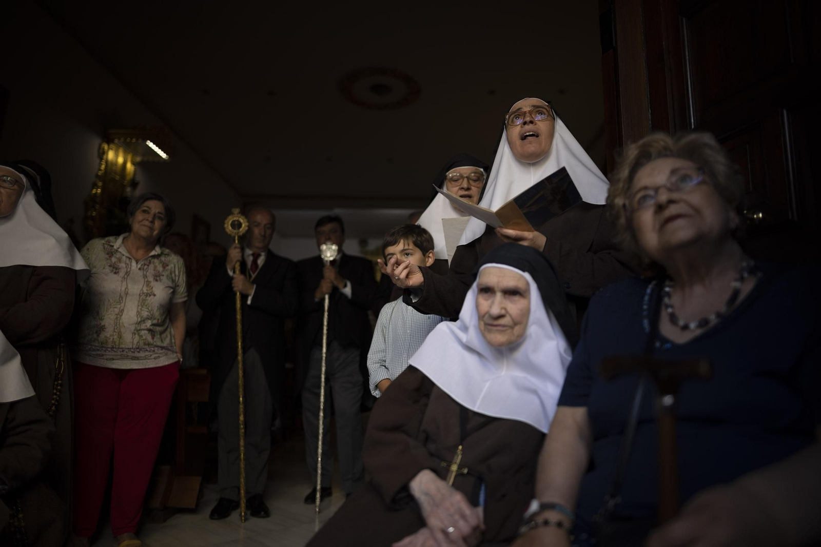 Imágenes de la salida extraordinaria de La Borriquita por las calles de Huelva