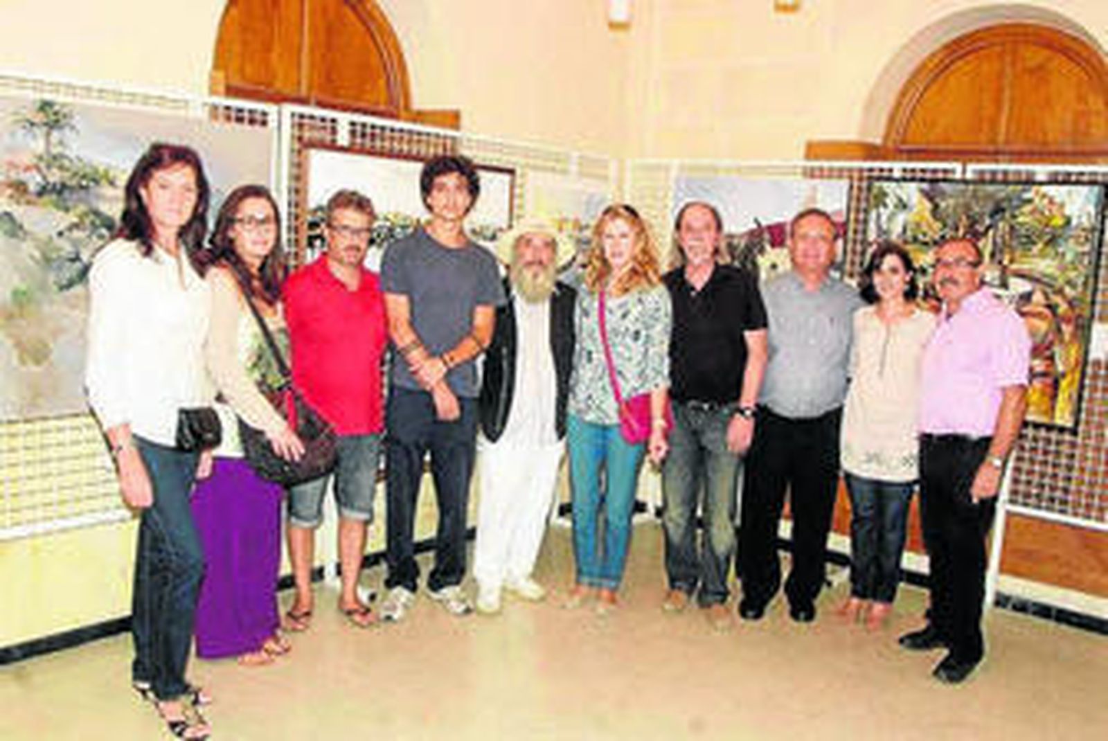 La concejala María Dolores Ortega con el jurado y los premiados.