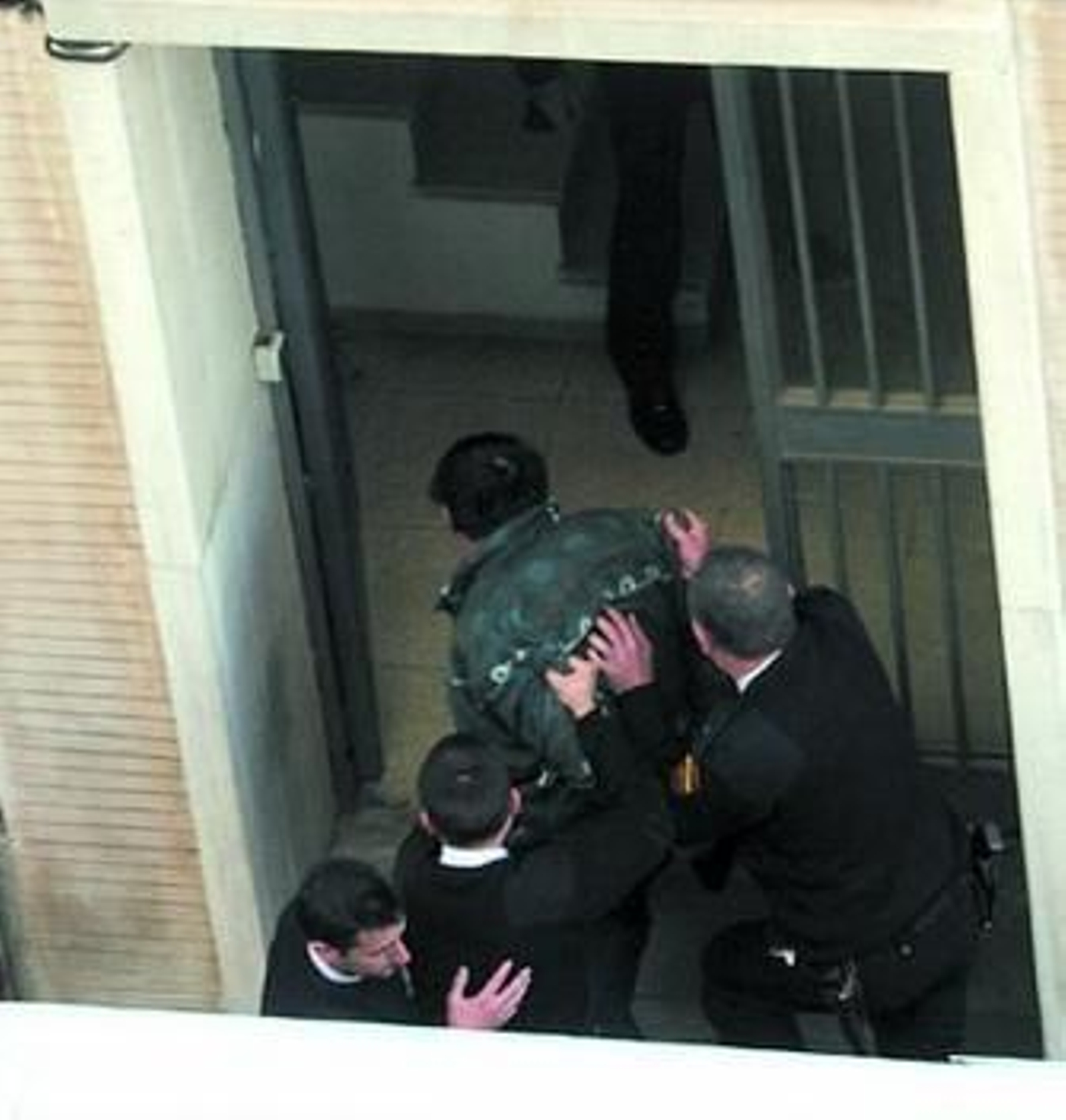 El presunto asesino, a su llegada al Palacio de Justicia de Huelva.