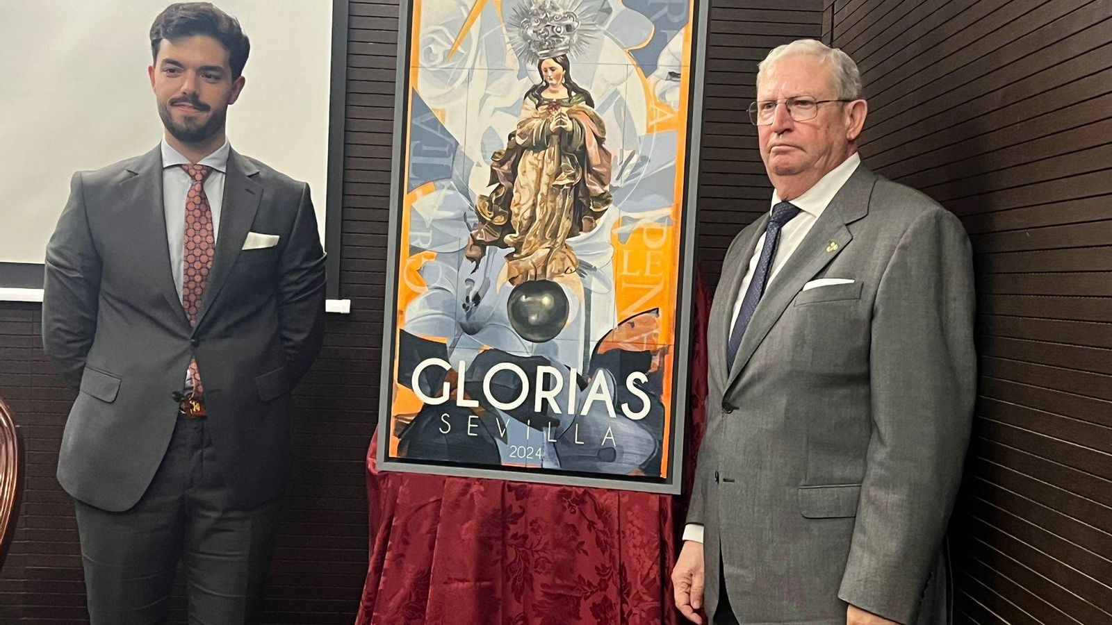 El cartelista junto al presidente del Consejo, Francisco Vélez