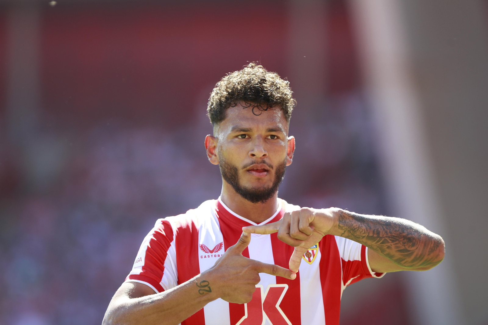 Imágenes del empate a 3 de la U.D. Almería y el Granada C.F.