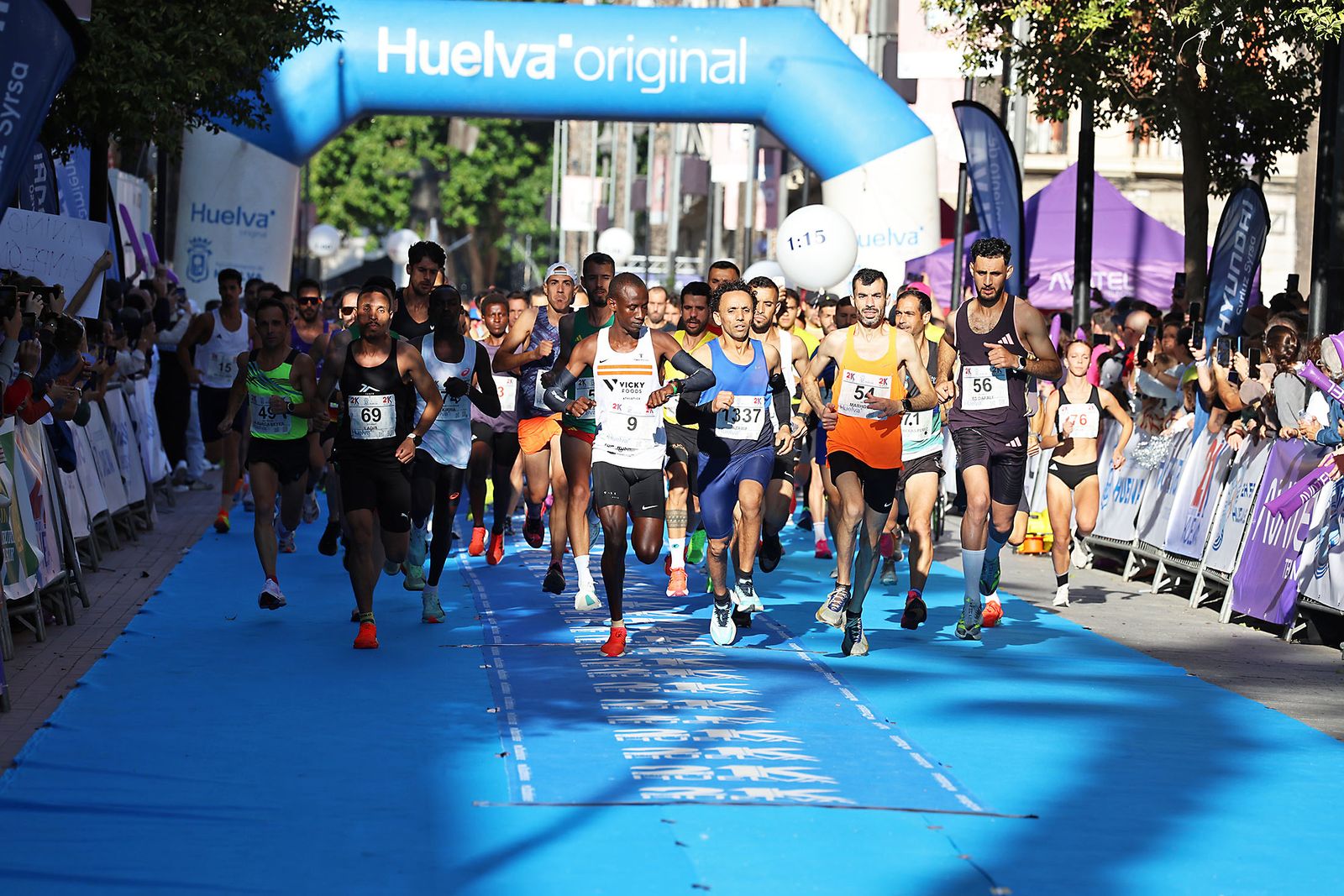 Las mejores imágenes de la carrera 21K Ciudad de Huelva